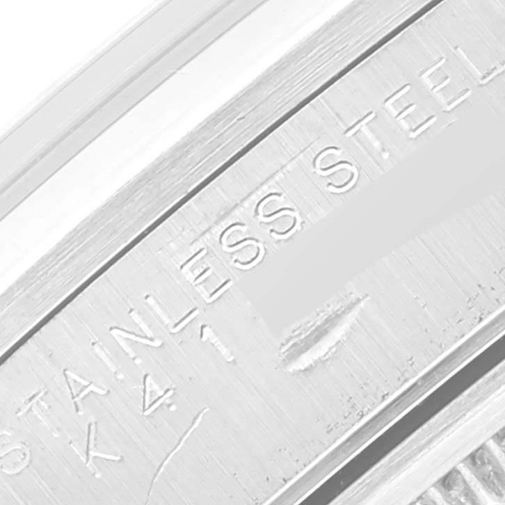 This image shows a close-up of the stainless steel engraving on the Rolex Air-King 14000 Men's Stainless Steel Silver Dial 14000 Men's Stainless Steel Silver Dial watch band.