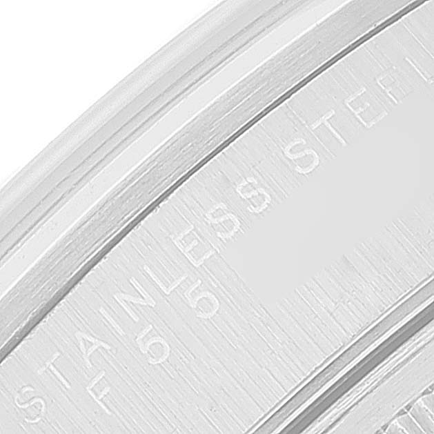 This close-up image shows the side profile of the casing with the "STAINLESS STEEL" marking on the Rolex Air-King 14000 Men's Stainless Steel Silver Dial 14000 Men's Stainless Steel Silver Dial watch.
