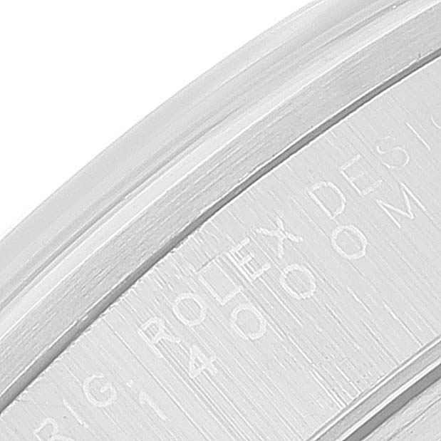 This close-up image shows the engraving on the case back of a Rolex Air-King 14000 Men's Stainless Steel Silver Dial 14000 Men's Stainless Steel Silver Dial watch.