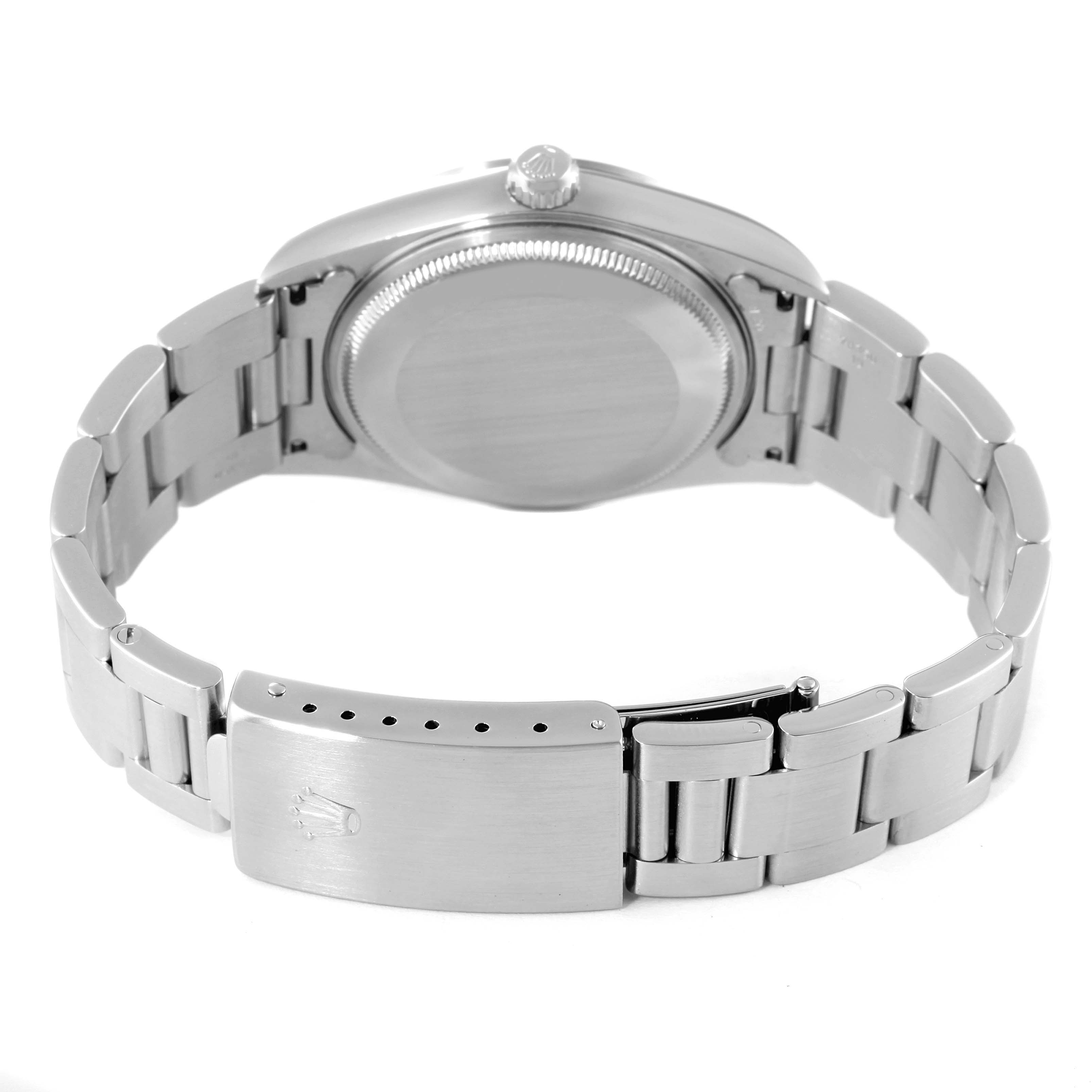 The image shows the back and underside of the Rolex Air-King 14000 Men's Stainless Steel Silver Dial 14000 Men's Stainless Steel Silver Dial watch, highlighting its case back, bracelet, and clasp.