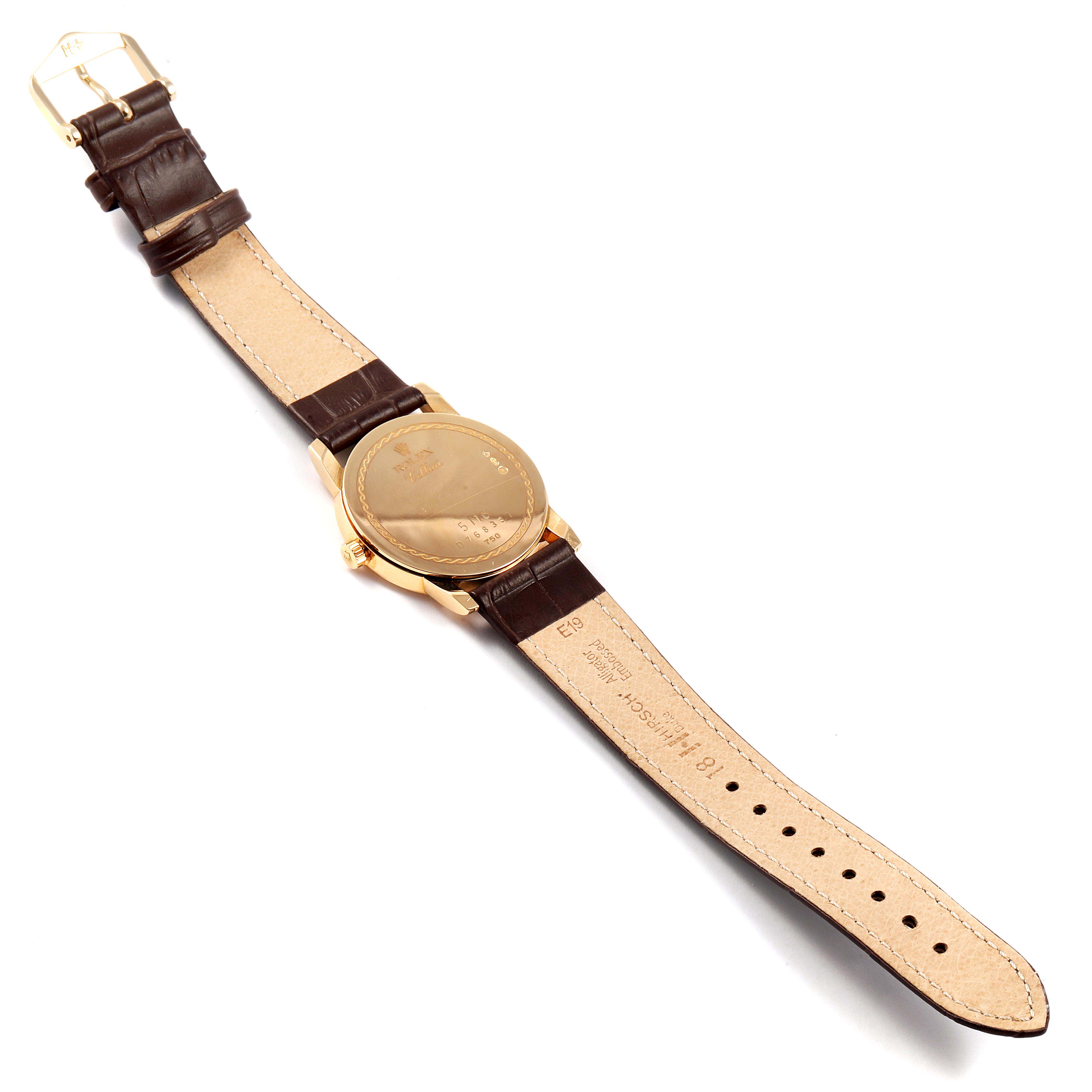 The image shows a Rolex Cellini 5116 Men's Yellow Gold Mother of Pearl Dial 5116 Men's Yellow Gold Mother of Pearl Dial watch from a top-down angle, highlighting its back case and leather straps.