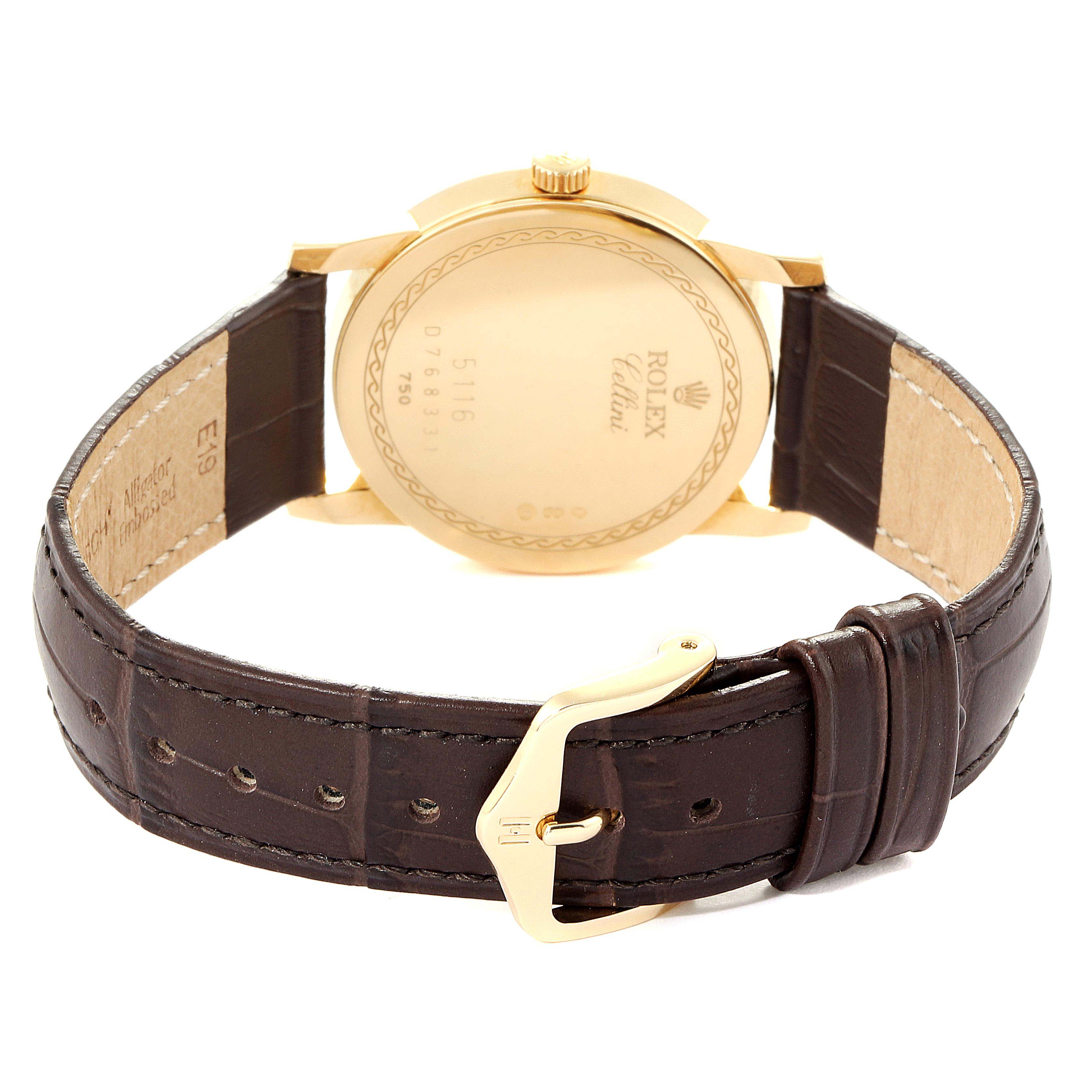 The image shows the back view of a Rolex Cellini 5116 Men's Yellow Gold Mother of Pearl Dial 5116 Men's Yellow Gold Mother of Pearl Dial watch, highlighting its case back, crown, leather strap, and buckle.