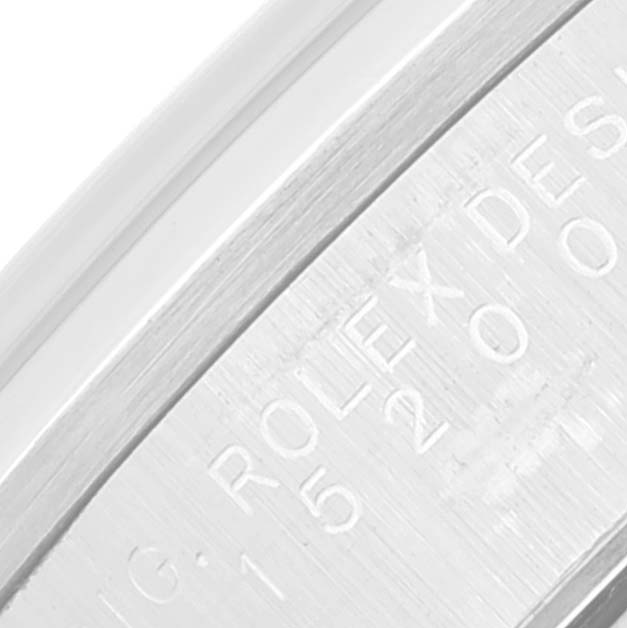 This is a close-up of the engraving on the side of the case for a Date model by Rolex.