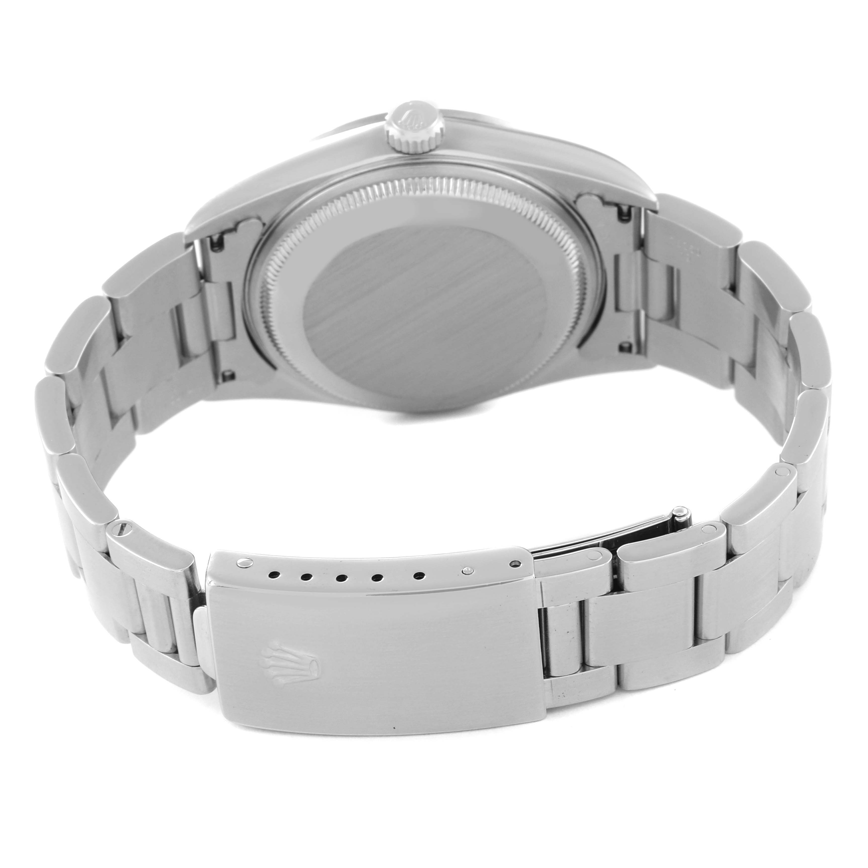 The image shows the back view of a Rolex Date 15200 Men's Stainless Steel Black Dial 15200 Men's Stainless Steel Black Dial watch, including the case back, crown, and the bracelet with the clasp.