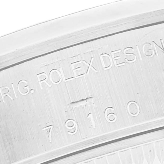 The image shows a close-up of the model number "79160" engraved on the case of the Rolex Date 79160 Women's Stainless Steel Black Dial 79160 Women's Stainless Steel Black Dial watch.