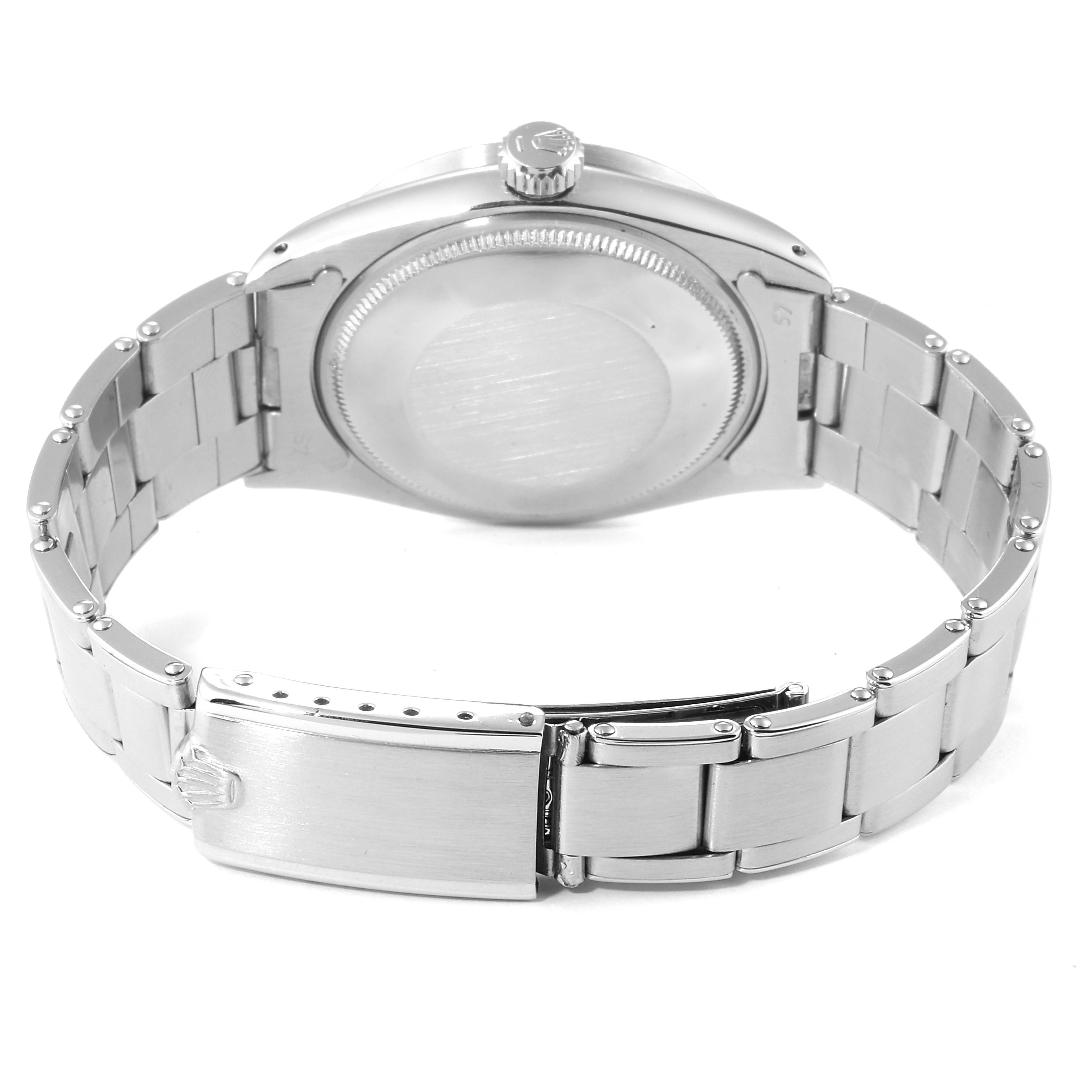 The image shows the backside and bracelet of the Rolex Vintage Collection 1501 Men
s Stainless Steel Blue Dial 1501 Men
s Stainless Steel Blue Dial model watch.