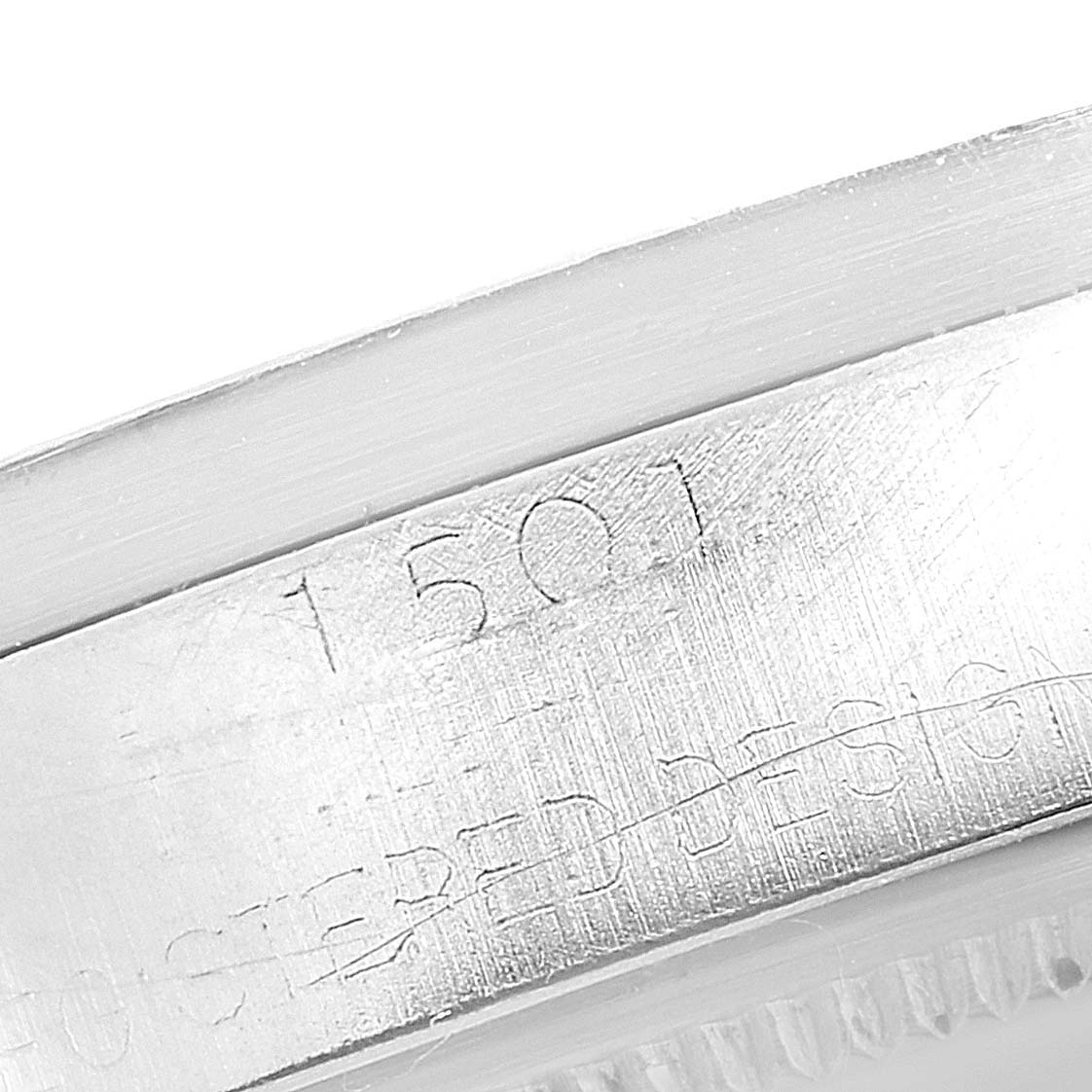 This image shows a close-up of the model number engraving on the side of a Vintage Collection Rolex watch.