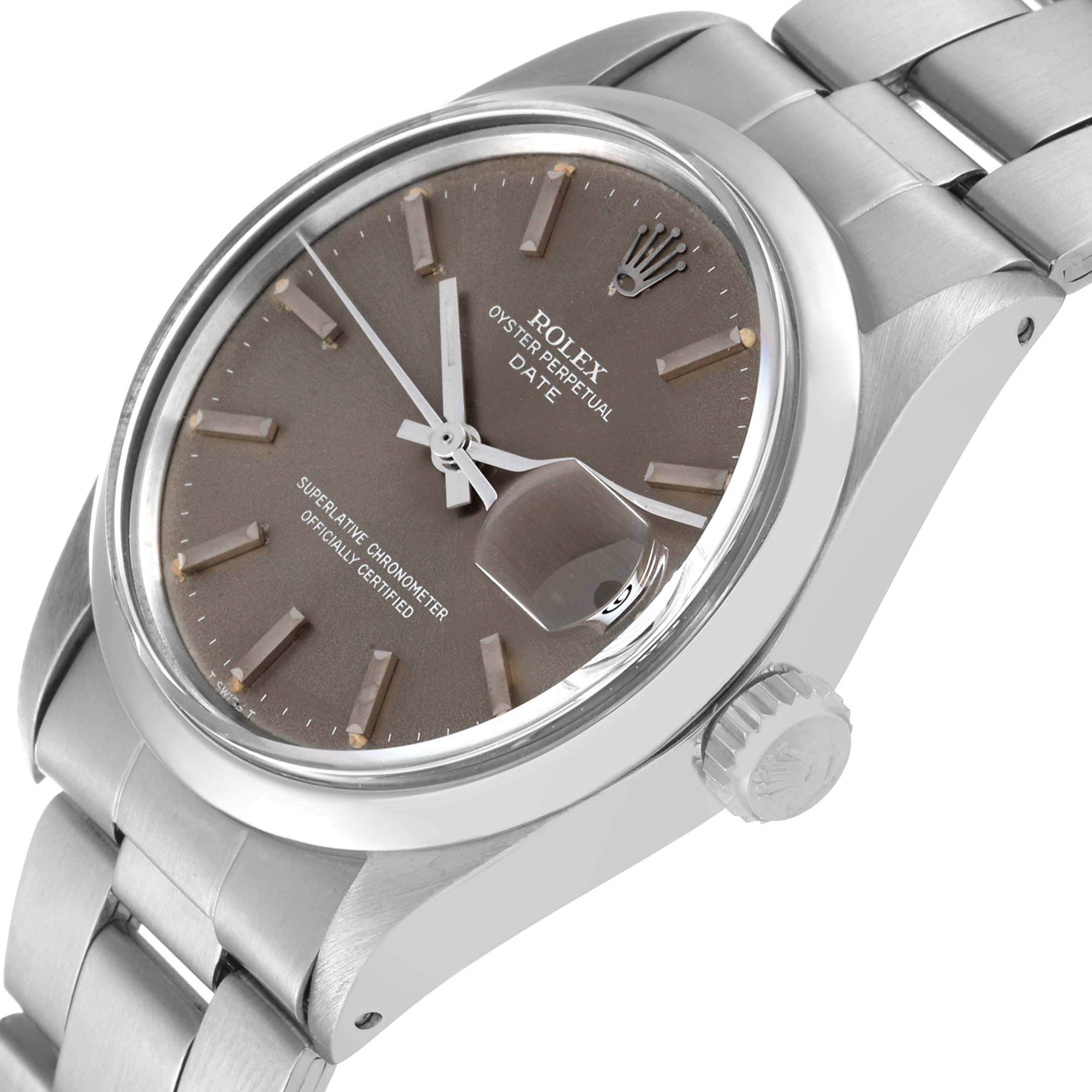 The image shows a Rolex Vintage Collection 1500 Men's Stainless Steel Grey Dial 1500 Men's Stainless Steel Grey Dial Oyster Perpetual Date watch from an angled side view, highlighting the dial, crown, and bracelet.