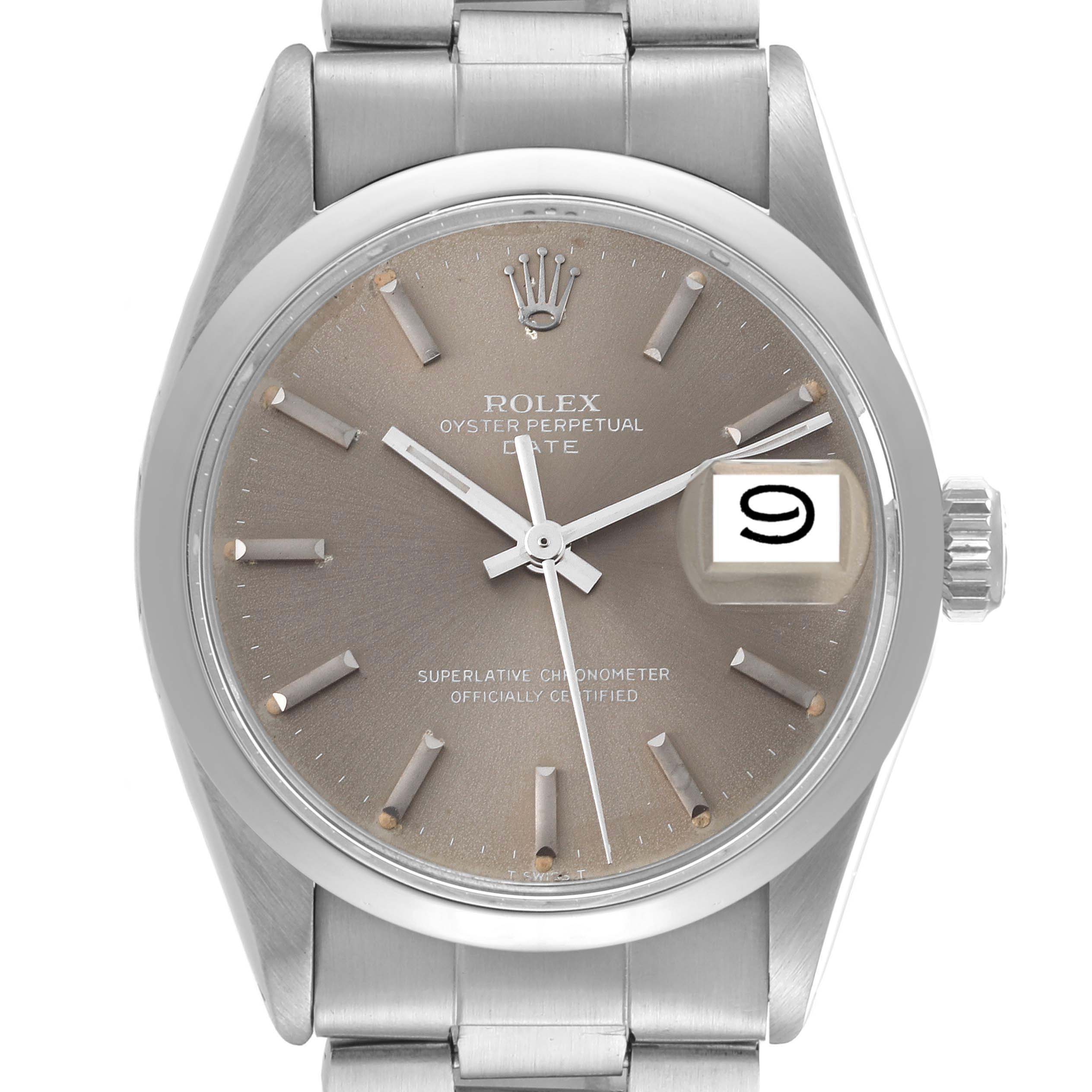 This image shows a frontal view of the Rolex Vintage Collection 1500 Men's Stainless Steel Grey Dial 1500 Men's Stainless Steel Grey Dial Oyster Perpetual Date watch, showcasing its dial, hands, and date display.