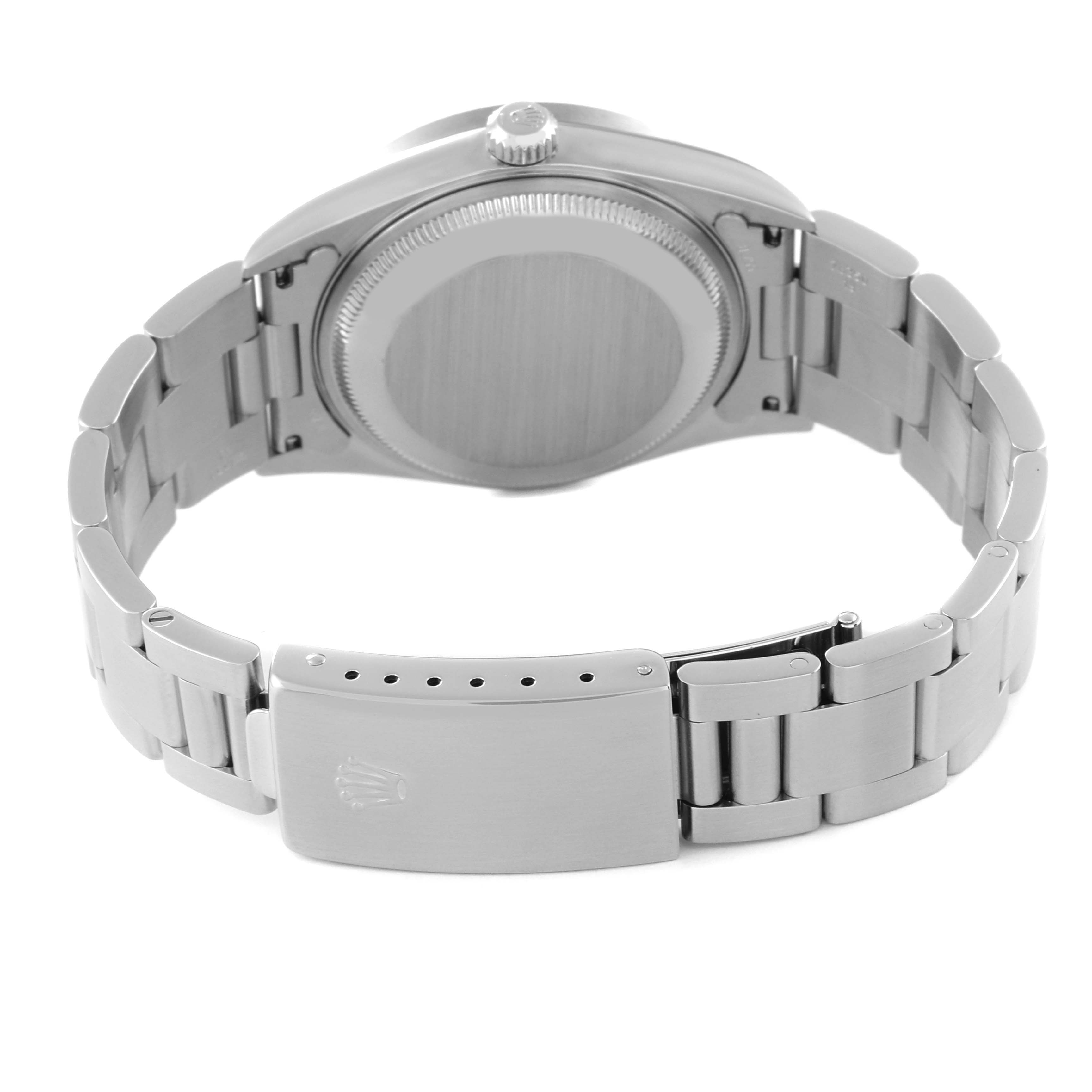 This image shows the back and clasp of a Rolex Date 15210 Men's Stainless Steel Silver Dial 15210 Men's Stainless Steel Silver Dial model watch.