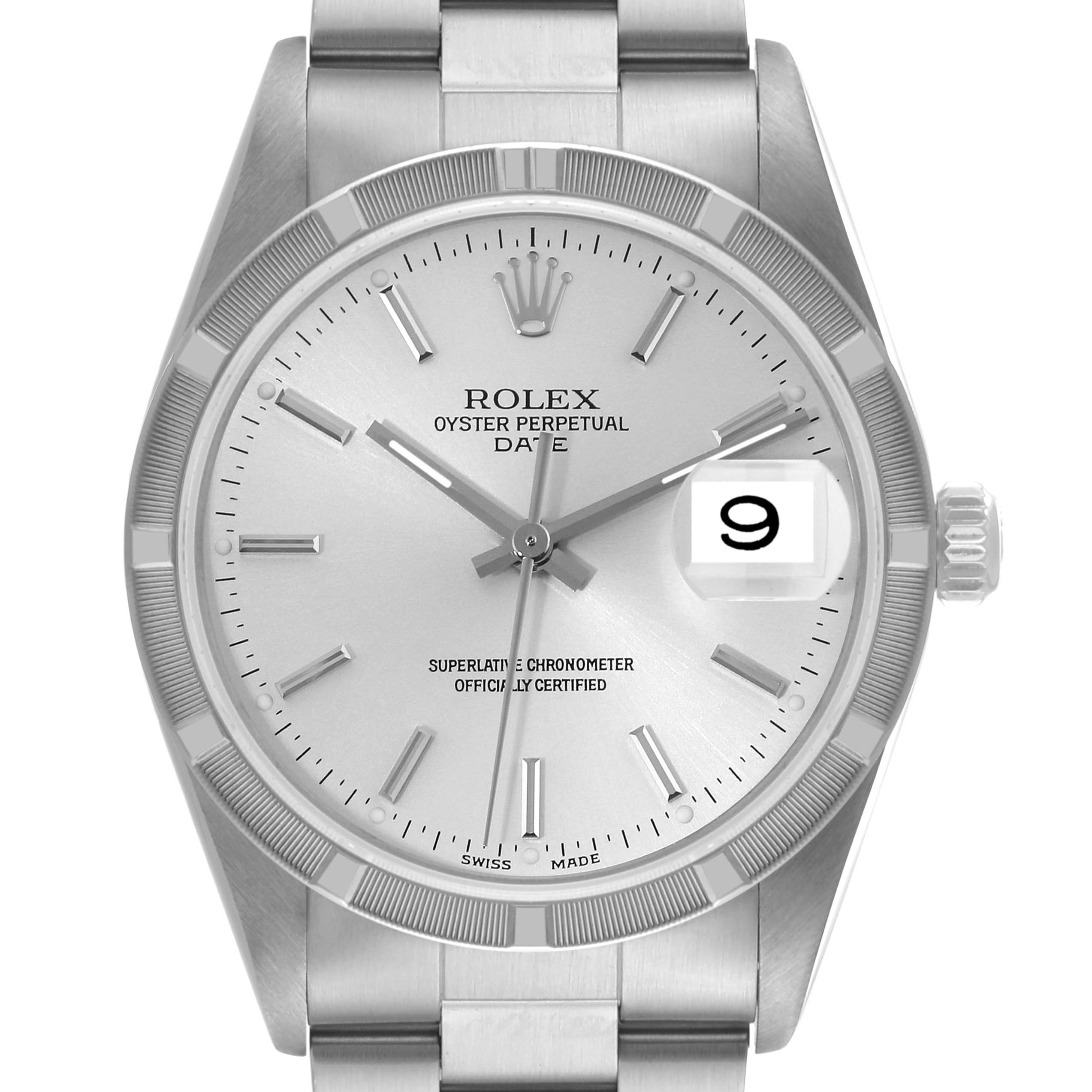 The image shows a front view of a Rolex Oyster Perpetual Date watch with its dial, bezel, and part of the bracelet visible.