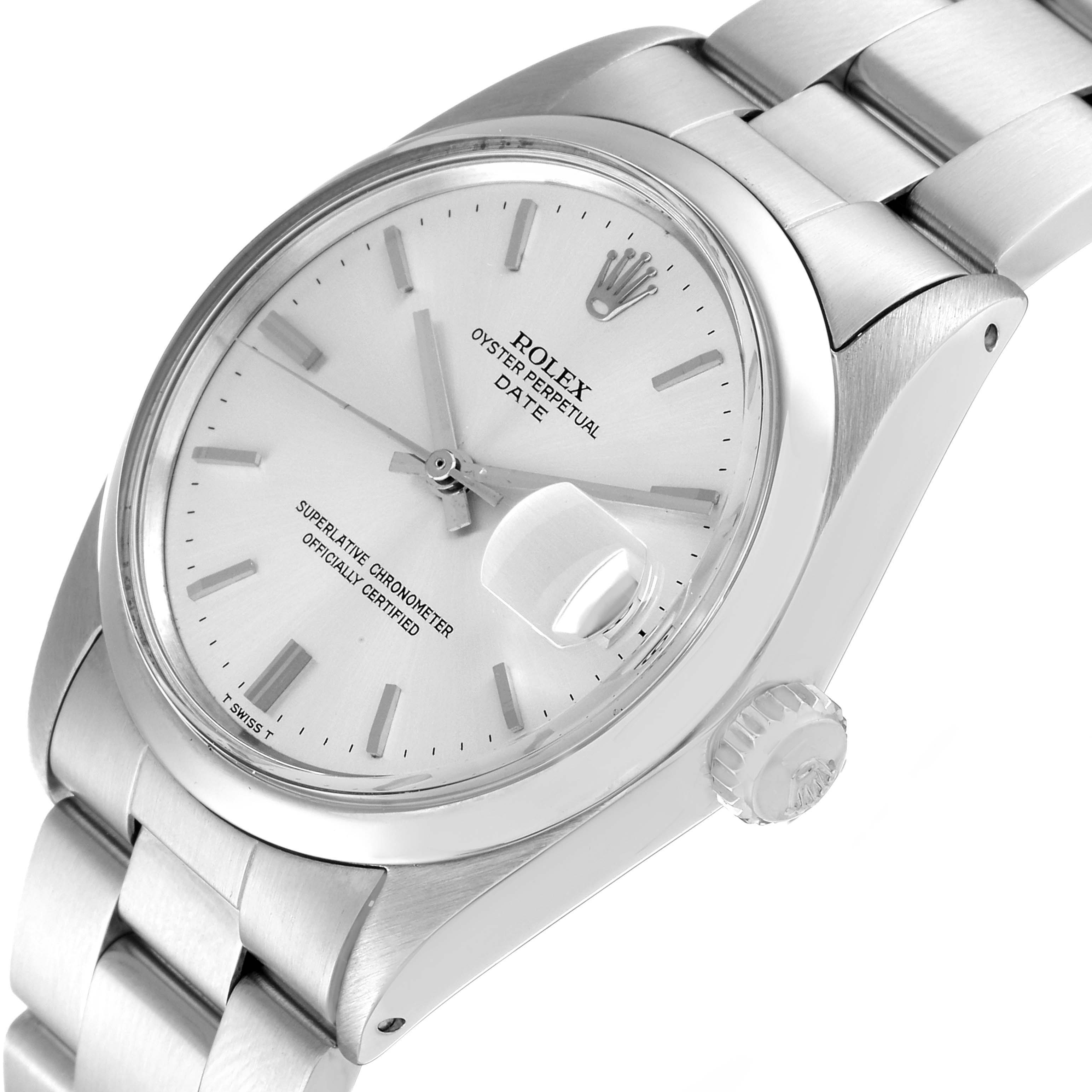 The image shows a close-up angle of the Rolex Vintage Collection 1500 Men's Stainless Steel Silver Dial 1500 Men's Stainless Steel Silver Dial watch face and part of its metal band.