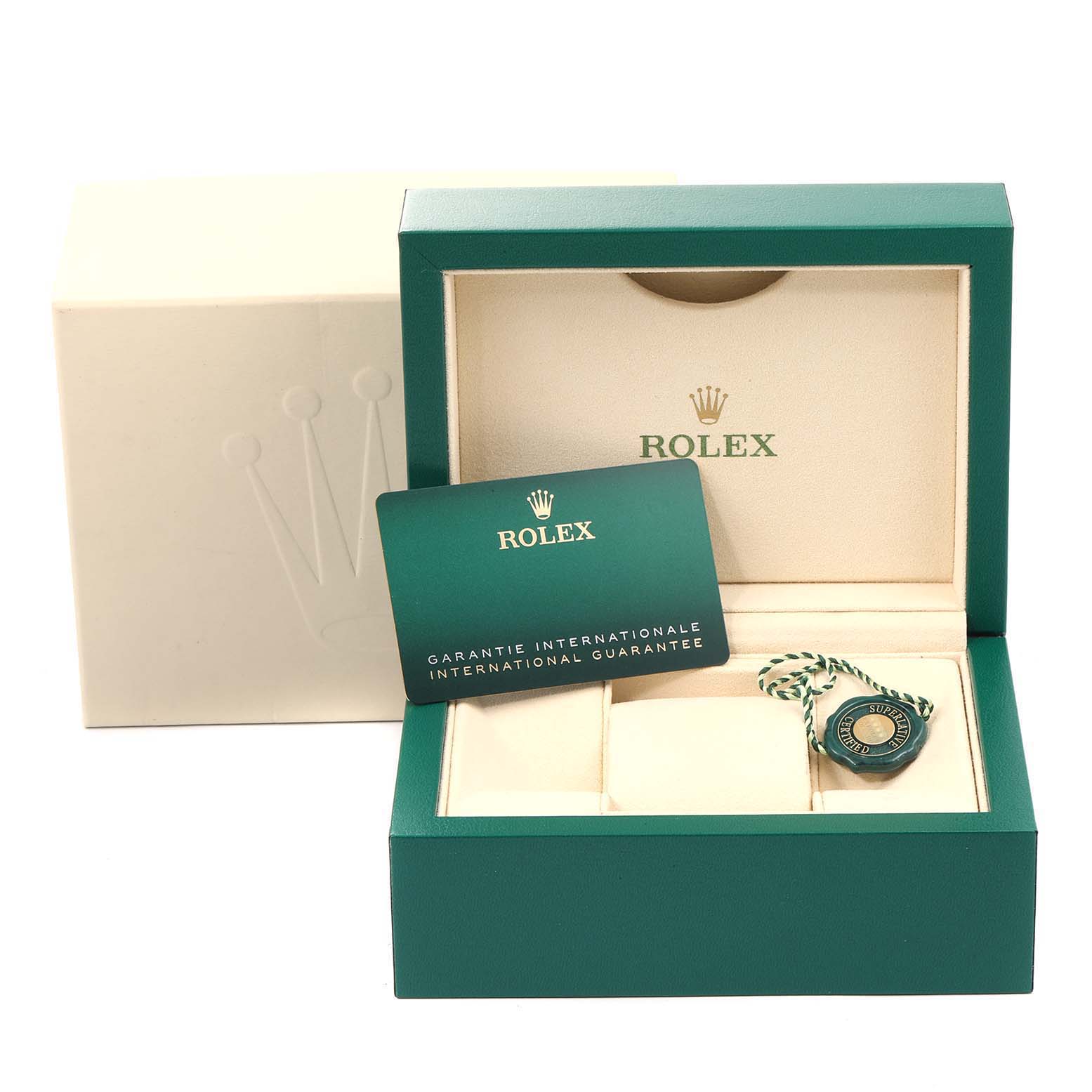 The image shows the presentation box of the Rolex Datejust 279174 Women's Stainless Steel Pink Dial 279174 Women's Stainless Steel Pink Dial, featuring the international guarantee card and a Rolex tag.