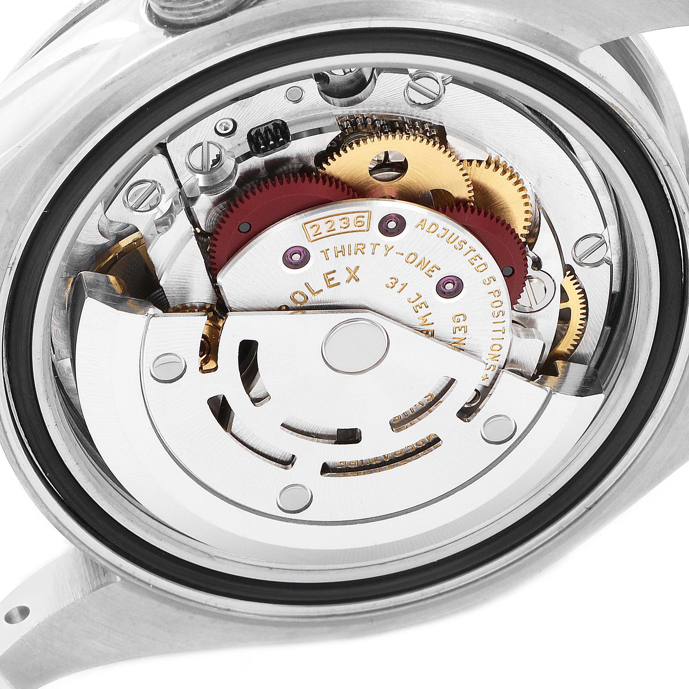 This is an angled view of the Rolex Datejust 279174 Women's Stainless Steel Pink Dial 279174 Women's Stainless Steel Pink Dial's open case back, showcasing its intricate movement and inner components.