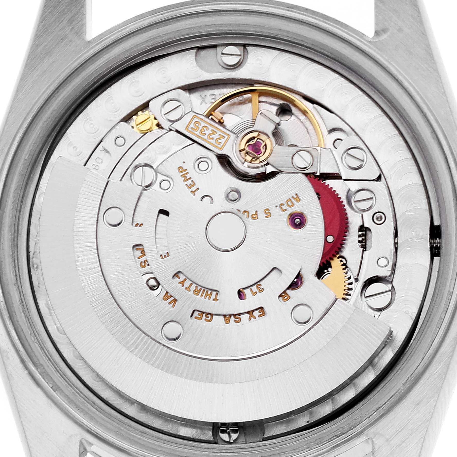 This image shows the internal mechanism and movement of the Rolex Mid-Size 78240 Women's Stainless Steel Black Dial 78240 Women's Stainless Steel Black Dial model watch from a top-down angle.