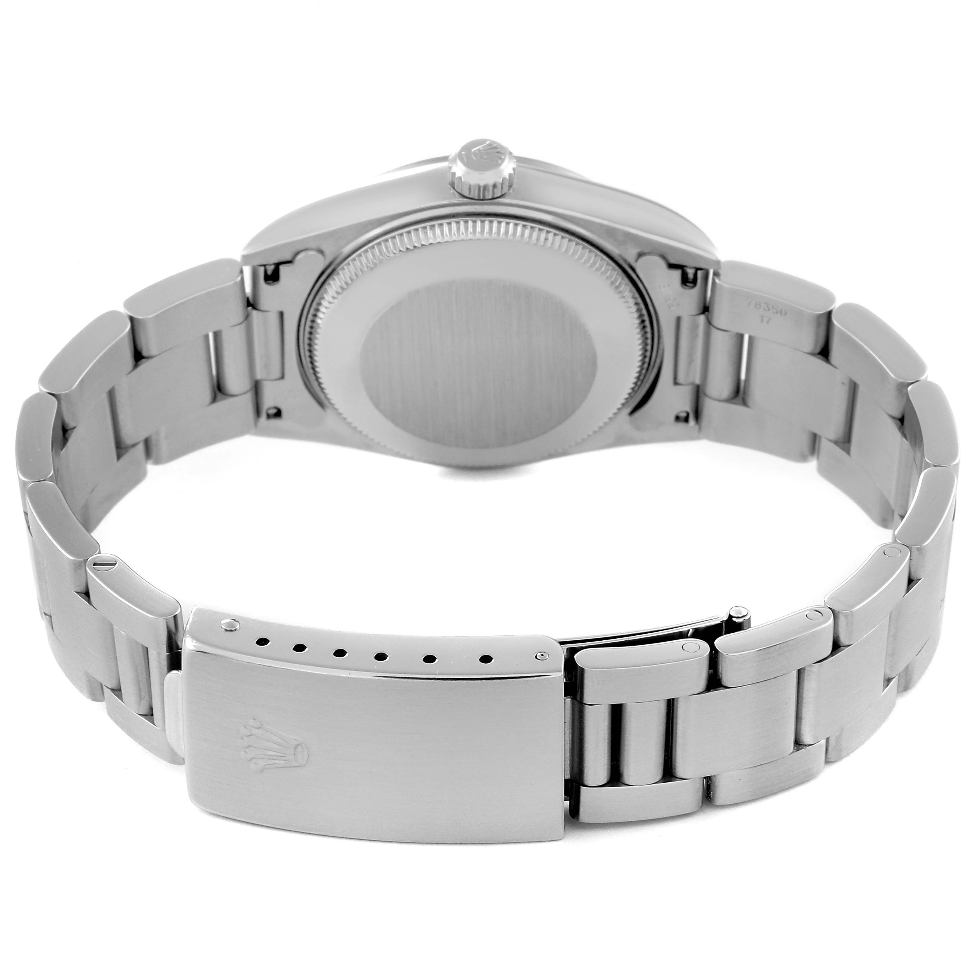 This Mid-Size Rolex watch is shown from the rear angle, featuring the case back, crown, and metal bracelet with buckle.