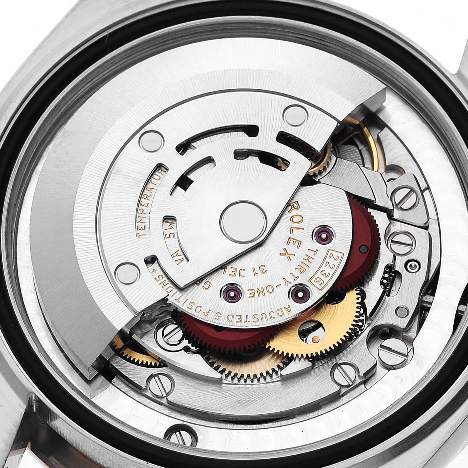 The image shows the inner movement mechanism of a Rolex Datejust 278241 Women's Stainless Steel White Dial watch, viewed from the back.
