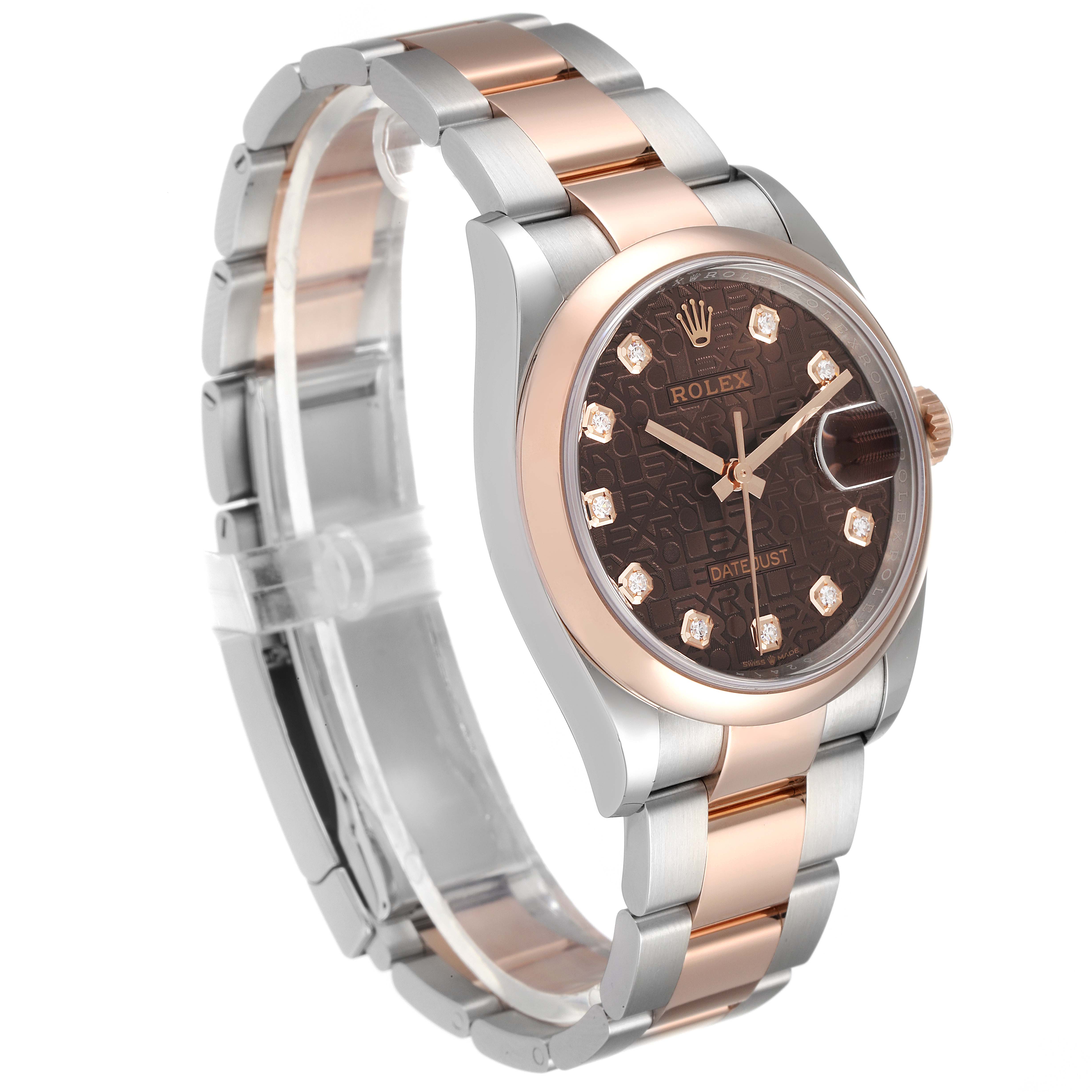 The image shows a side-front view of a Rolex Datejust 126201 Men's Steel and Gold (two tone) Brown Dial 126201 Men's Steel and Gold (two tone) Brown Dial watch, highlighting its bezel, dial, and bracelet.
