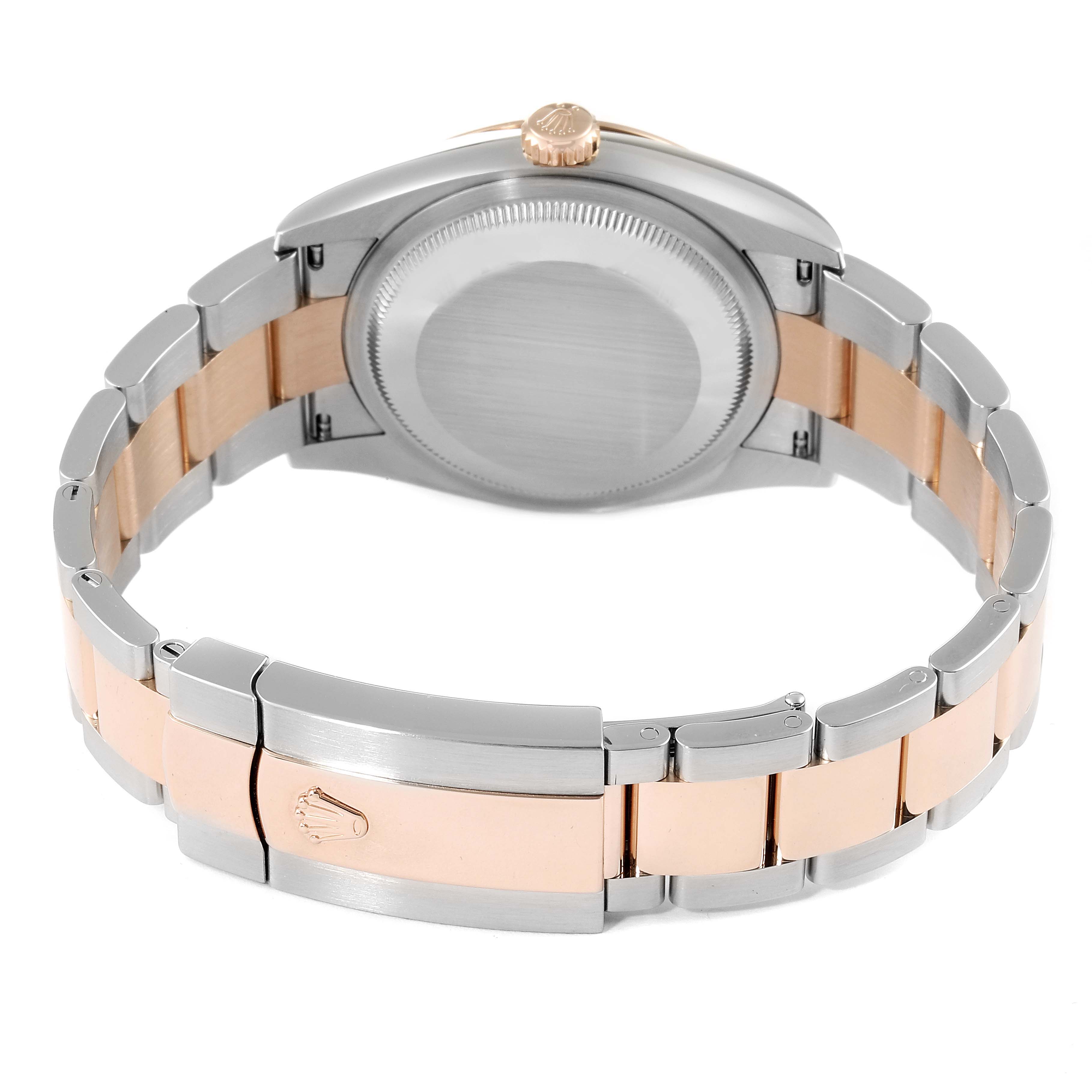 This image shows the back case and bracelet of a Rolex Datejust 126201 Men's Steel and Gold (two tone) Brown Dial 126201 Men's Steel and Gold (two tone) Brown Dial watch at an angle.