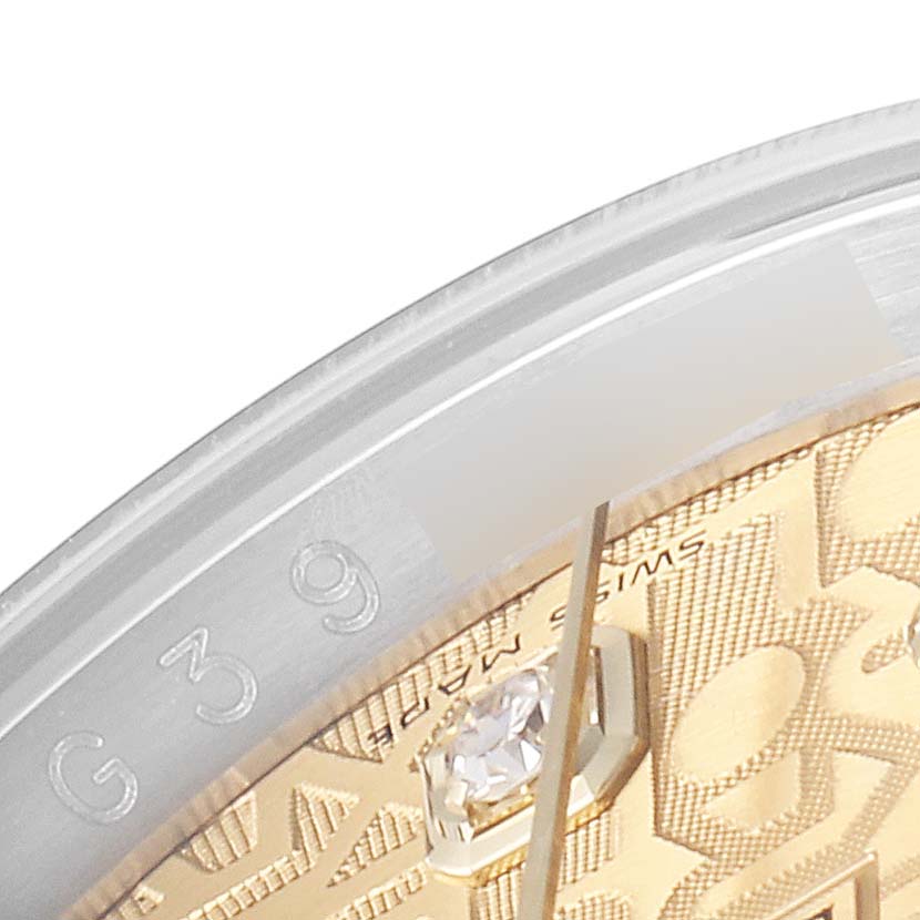 This image shows a close-up of the dial and bezel edge of a Rolex Datejust 116233 Men's Steel and Gold (two tone) Champagne Dial 116233 Men's Steel and Gold (two tone) Champagne Dial watch.