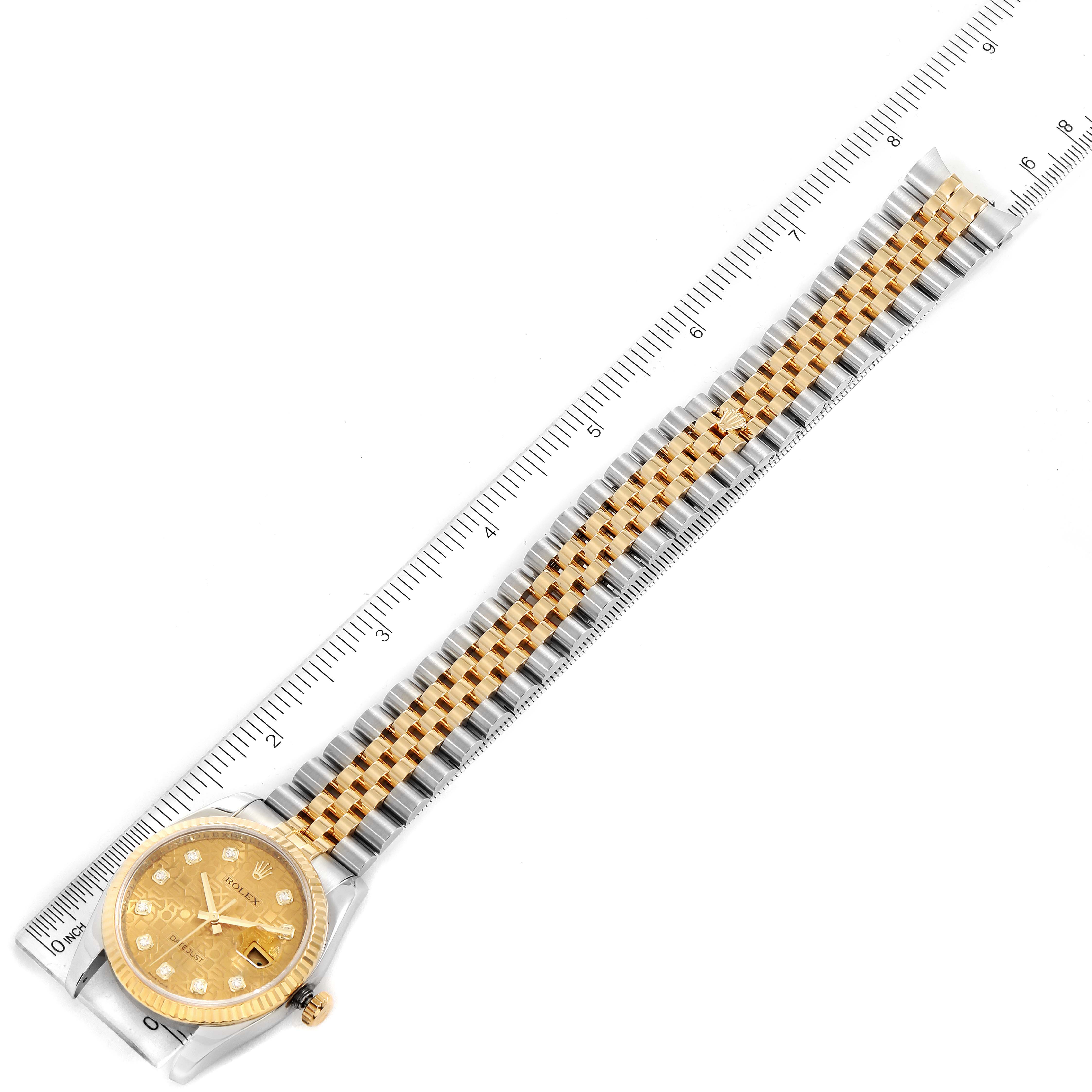 The image shows a top view of a Rolex Datejust 116233 Men's Steel and Gold (two tone) Champagne Dial 116233 Men's Steel and Gold (two tone) Champagne Dial watch, highlighting the full face, bezel, and strap on a ruler.