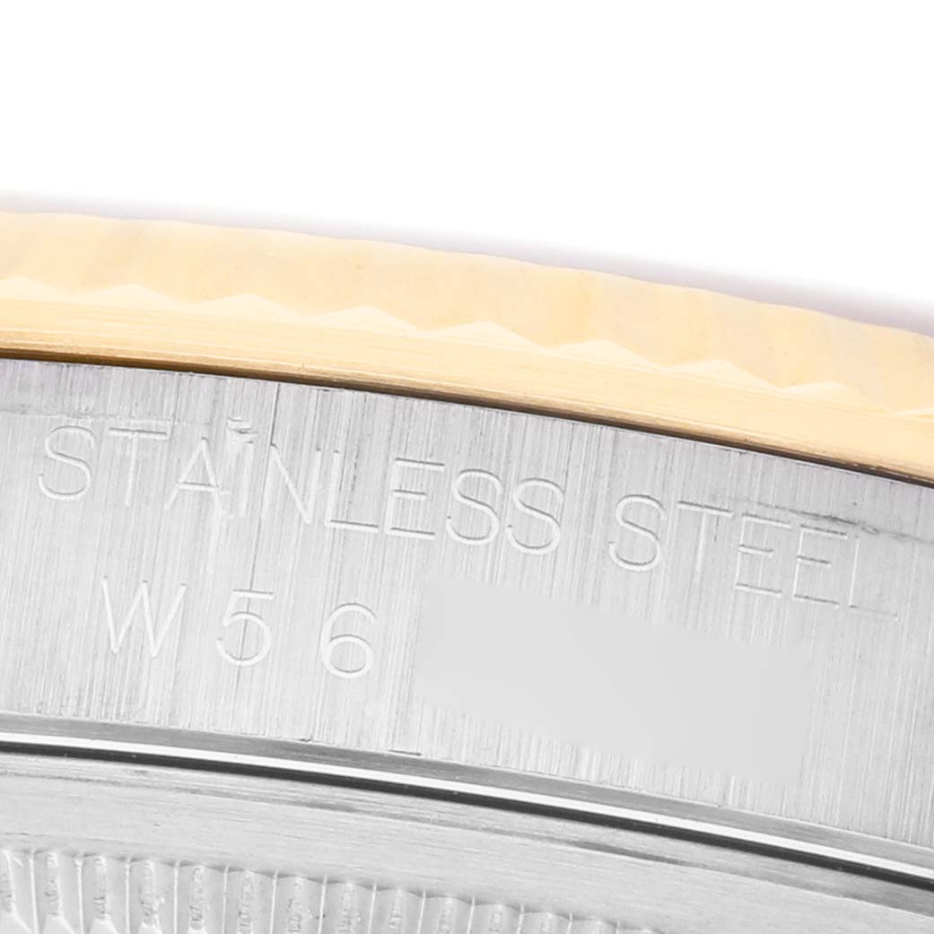 The image shows a close-up of the Rolex Datejust 16233 Men's Steel and Gold (two tone) White Dial watch's stainless steel case back with engraved text.
