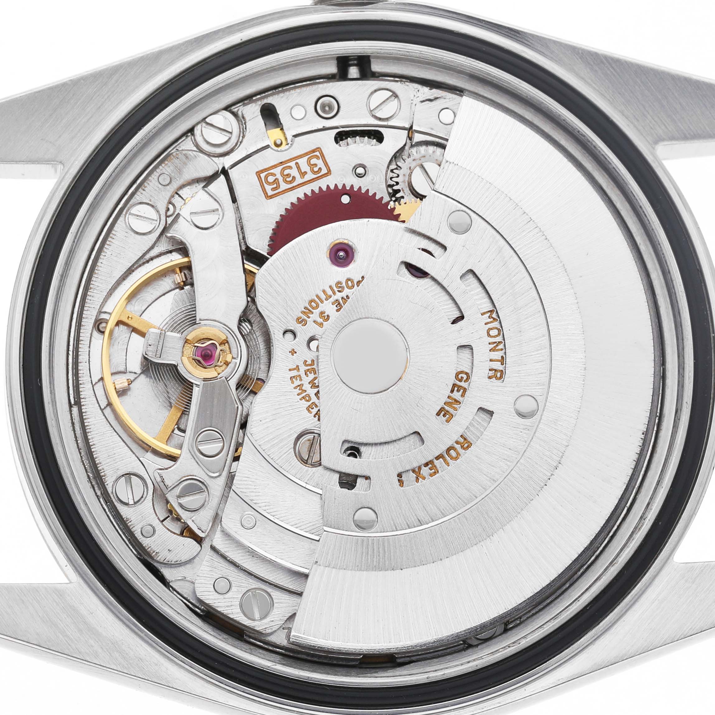 The image shows the movement mechanism of a Rolex Datejust 16233 Men's Steel and Gold (two tone) White Dial watch from a rear angle.