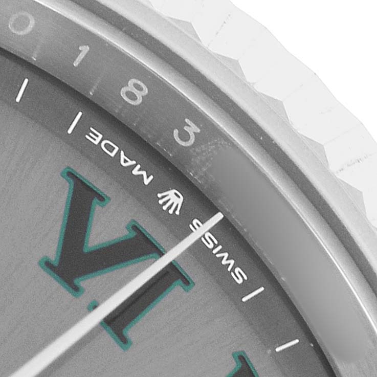 The image shows a close-up of the Rolex Datejust 41 126334 Men's Stainless Steel Grey Dial dial, focusing on the Roman numeral XII, part of the bezel, and "Swiss Made" text.
