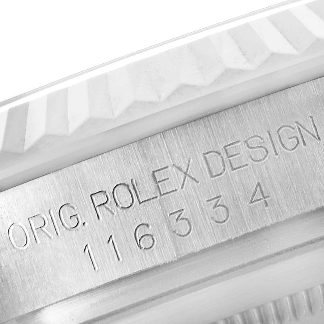 This image shows the side of the Rolex Datejust 41 116334 Men
s Stainless Steel Grey Dial 116334 Men
s Stainless Steel Grey Dial model, featuring the engraved serial number and the fluted bezel.