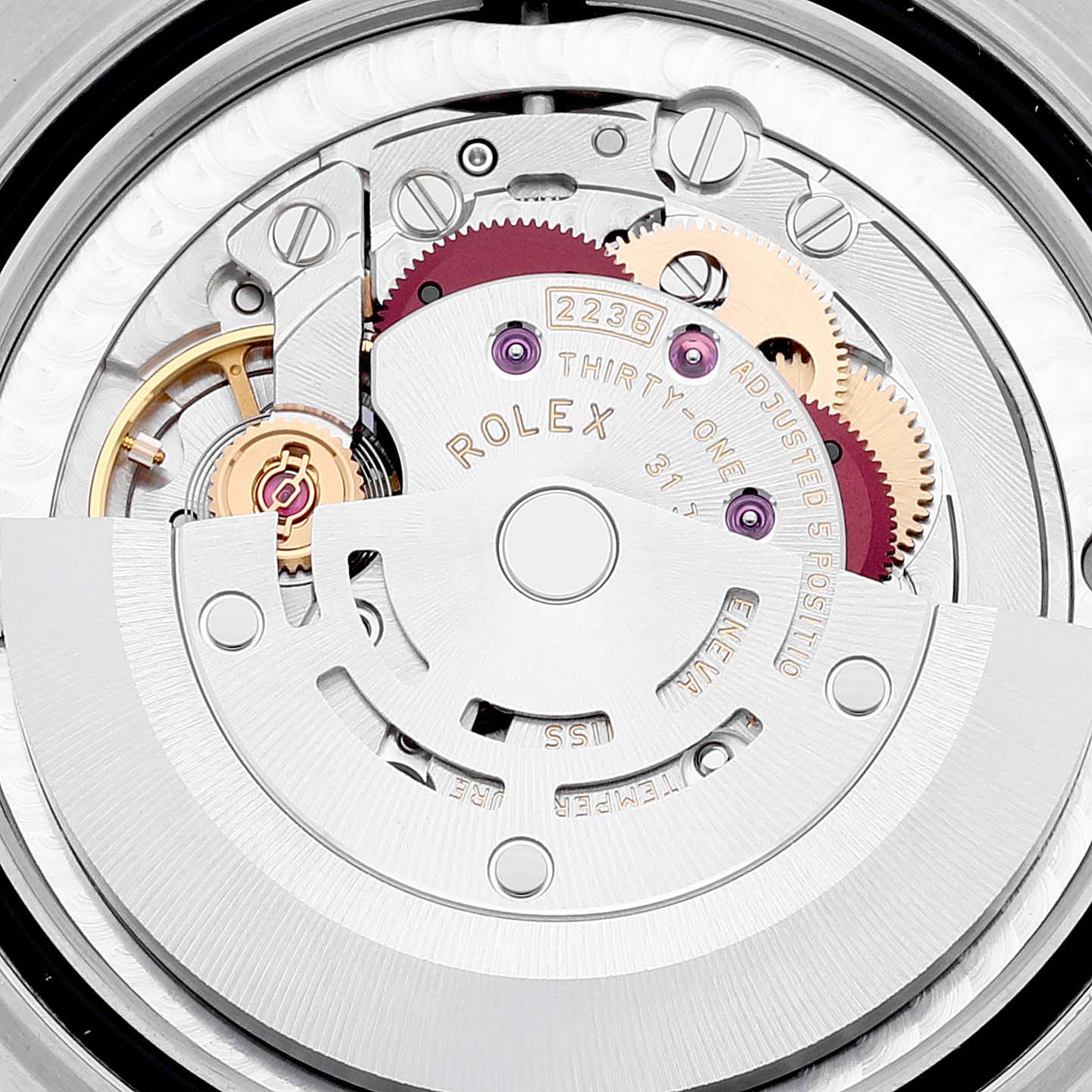 This image shows the intricate movement parts of a Rolex Mid-Size 278344 Women's Stainless Steel Purple Dial 278344 Women's Stainless Steel Purple Dial watch, featuring the caliber 2236 from a top-down angle.