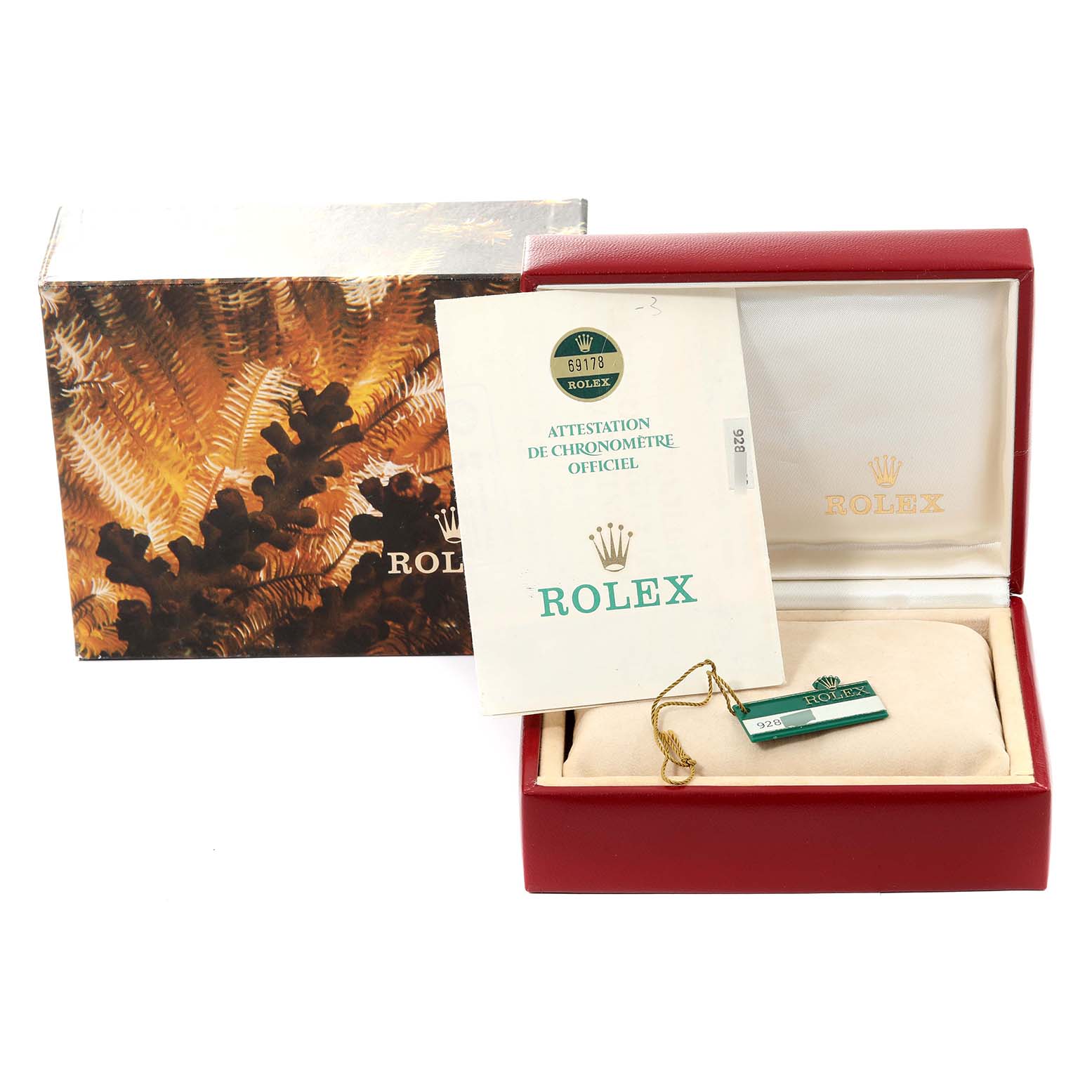 The image shows the packaging and accessories for a Rolex President 69178 Women's Yellow Gold White Dial 69178 Women's Yellow Gold White Dial model, including the box, booklet, and tag.