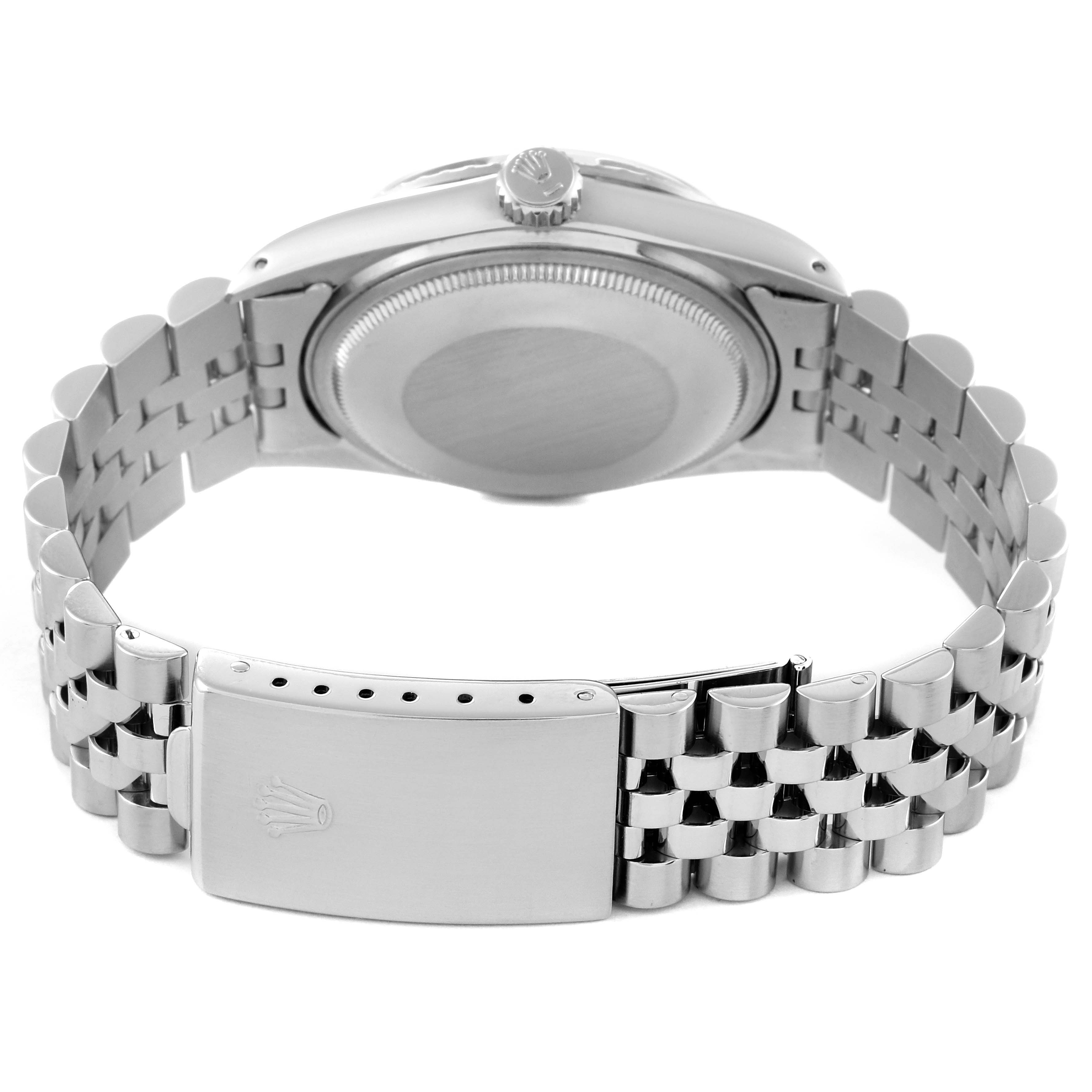 The image shows the back view of a Rolex Vintage Collection 16030 Men's Stainless Steel Silver Dial 16030 Men's Stainless Steel Silver Dial watch, focusing on the case back, crown, and bracelet clasp.