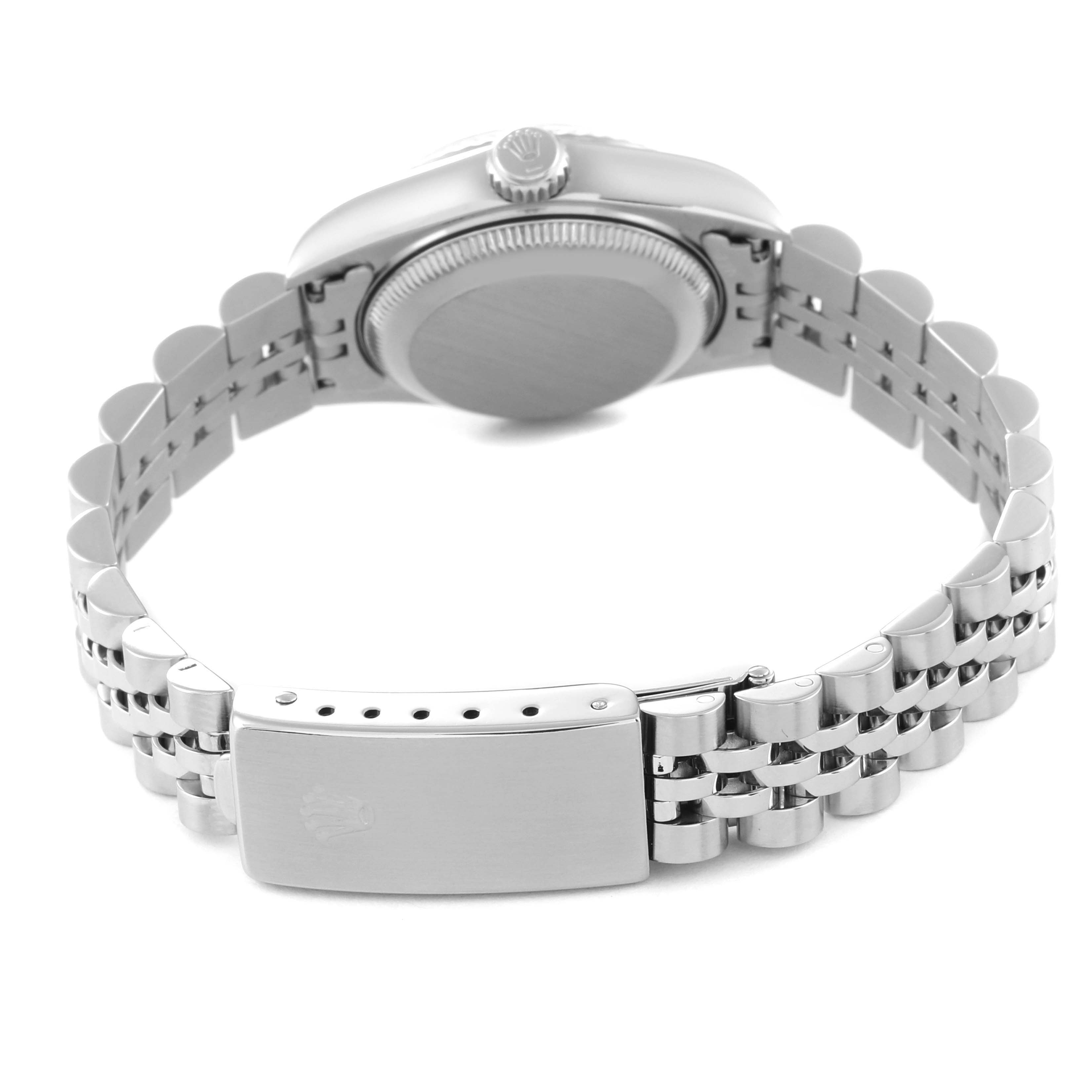 The image shows the back view of a Rolex Datejust 69174 Women's Stainless Steel Silver Dial 69174 Women's Stainless Steel Silver Dial watch, highlighting its clasp, bracelet, and case back.