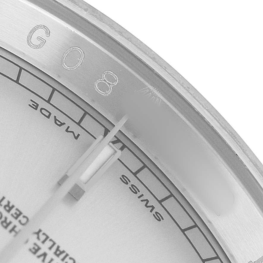 The image shows a close-up of the bezel and edge of the dial of a Rolex Datejust 116234 Men's Stainless Steel Silver Dial, highlighting the markings "G08" and "SWISS MADE."