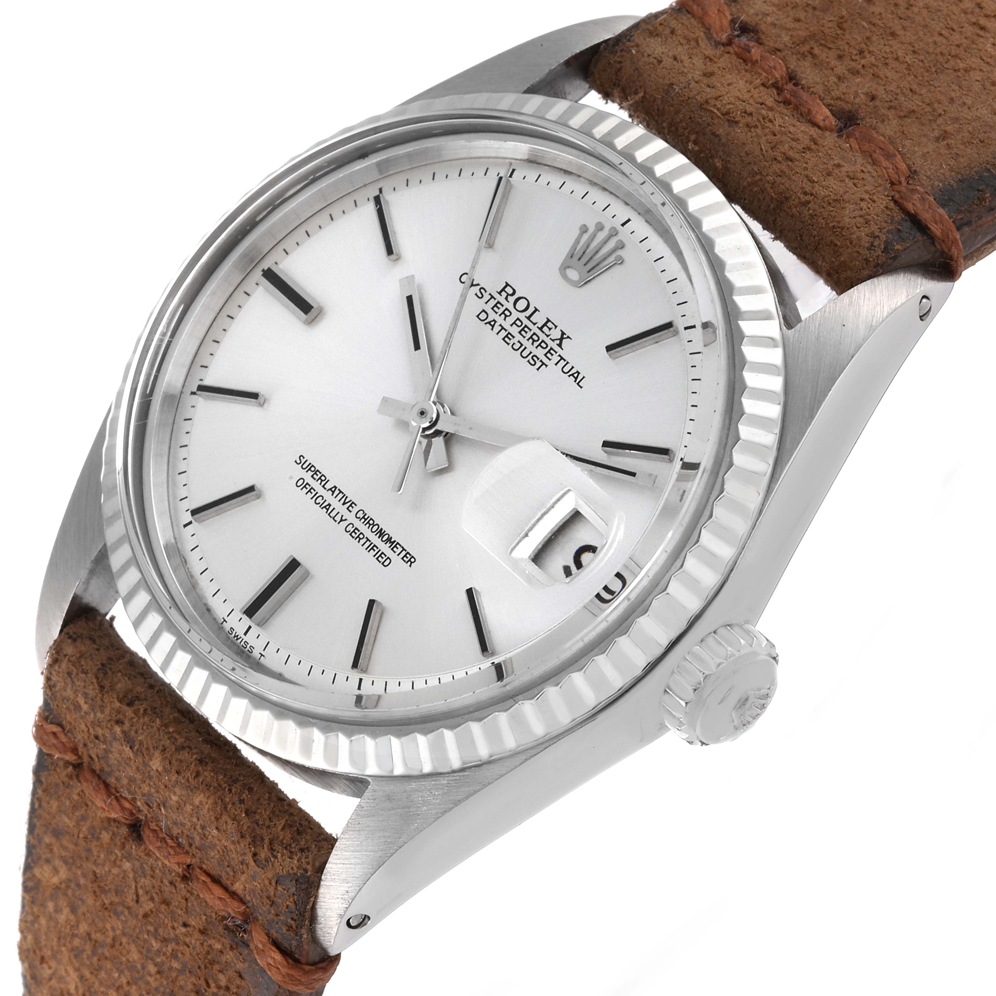 This is a side-angle view of the Rolex Vintage Collection 1601 Men's Stainless Steel Silver Dial 1601 Men's Stainless Steel Silver Dial watch, showcasing the face, bezel, crown, and leather strap.