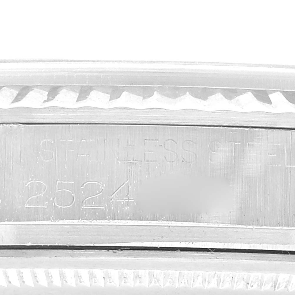 Close-up of the side view showing the bezel and serial number engraving on the Rolex Vintage Collection 1601 Men's Stainless Steel Silver Dial 1601 Men's Stainless Steel Silver Dial watch.
