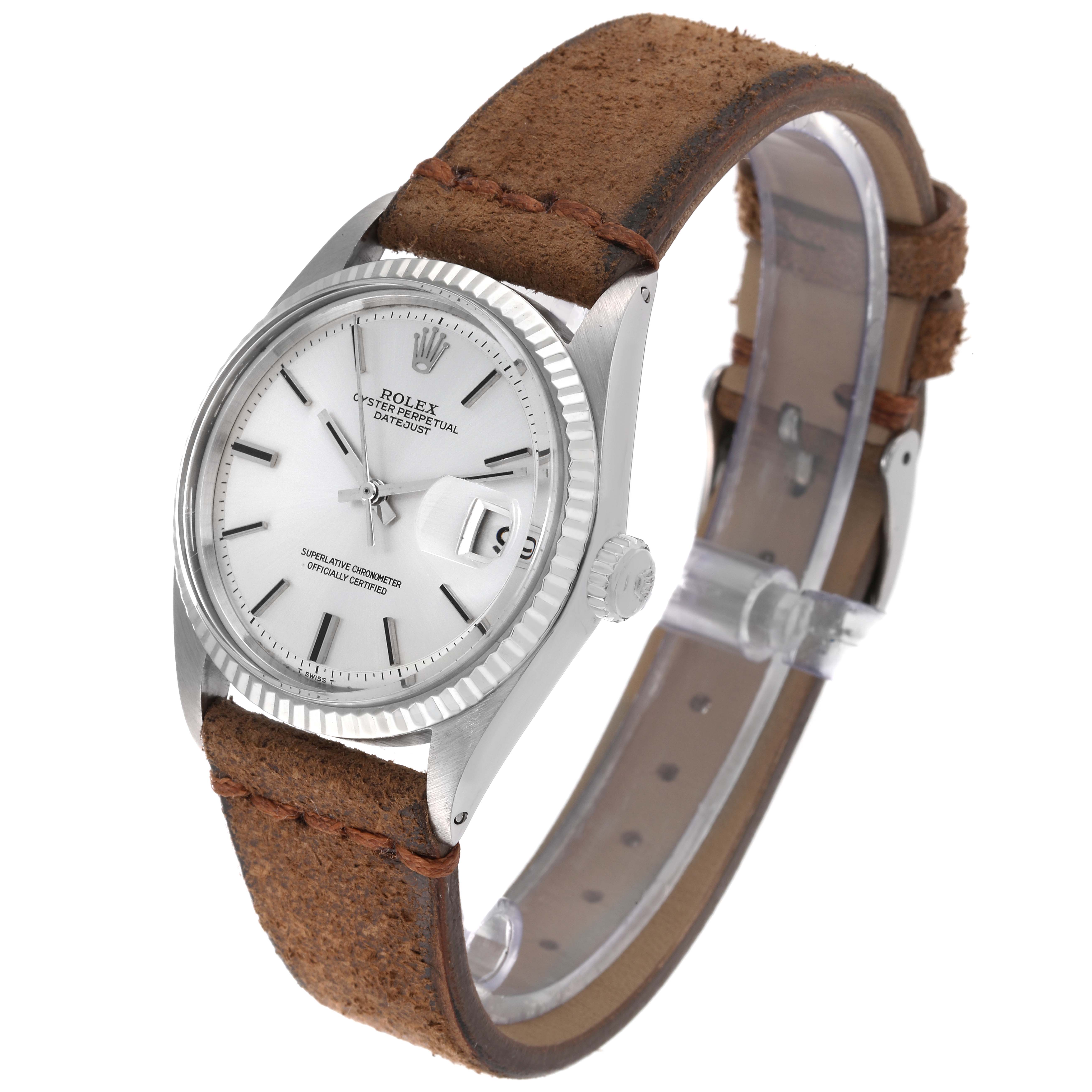 The image shows a side view of the Rolex Vintage Collection 1601 Men's Stainless Steel Silver Dial 1601 Men's Stainless Steel Silver Dial watch with a leather strap and a silver case.