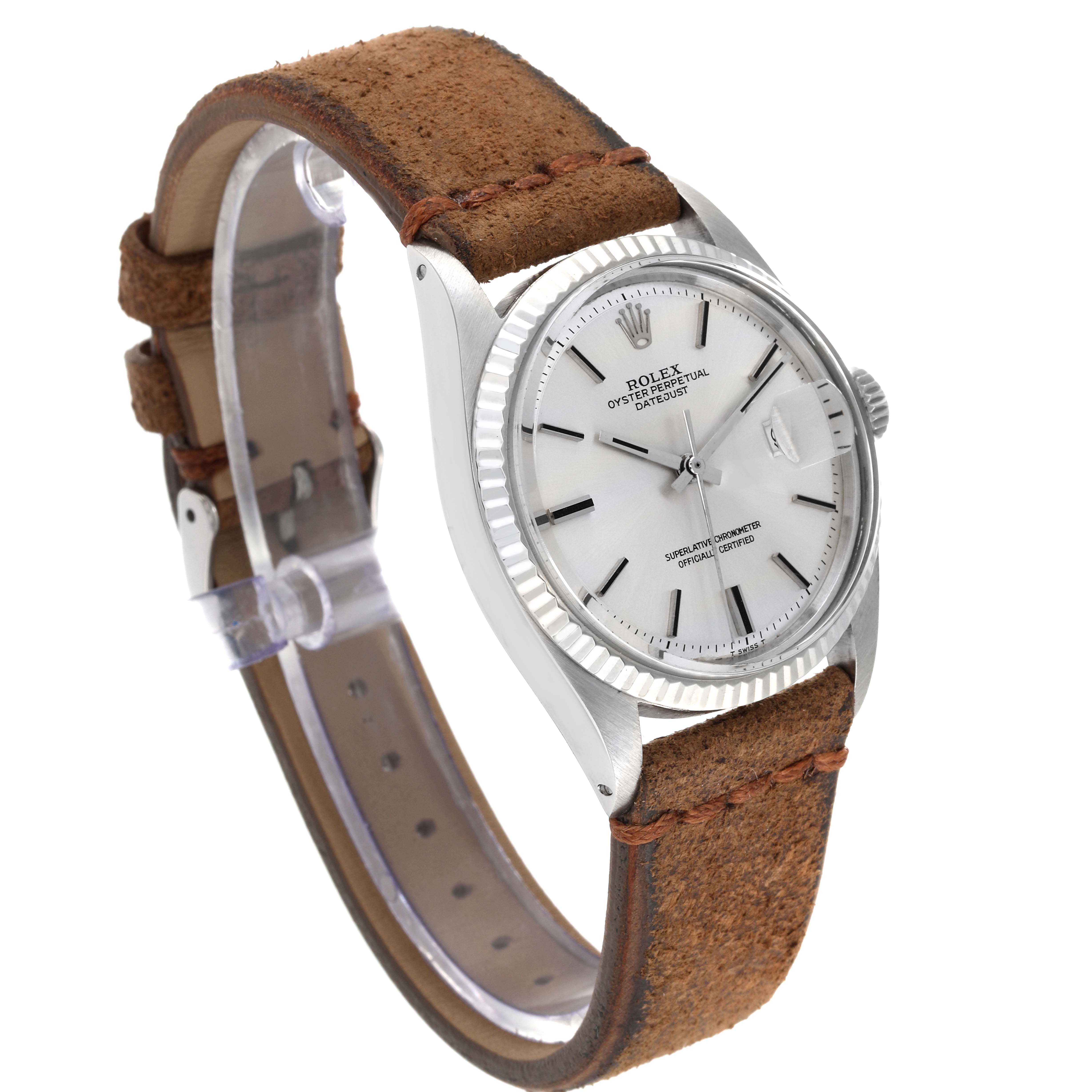 This image shows a side view of the Rolex Vintage Collection 1601 Men's Stainless Steel Silver Dial 1601 Men's Stainless Steel Silver Dial watch, highlighting the face, bezel, and leather strap.