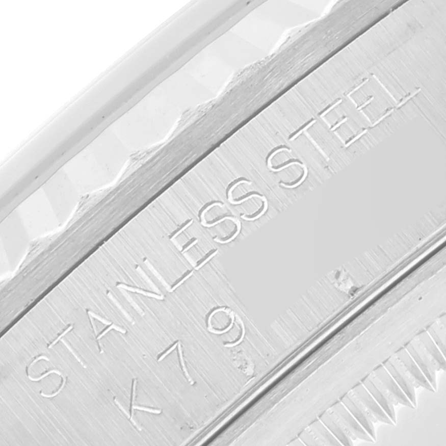 This close-up image shows the stainless steel casing and engraved details of a Rolex Datejust 16234 Men's Stainless Steel Silver Dial 16234 Men's Stainless Steel Silver Dial watch.