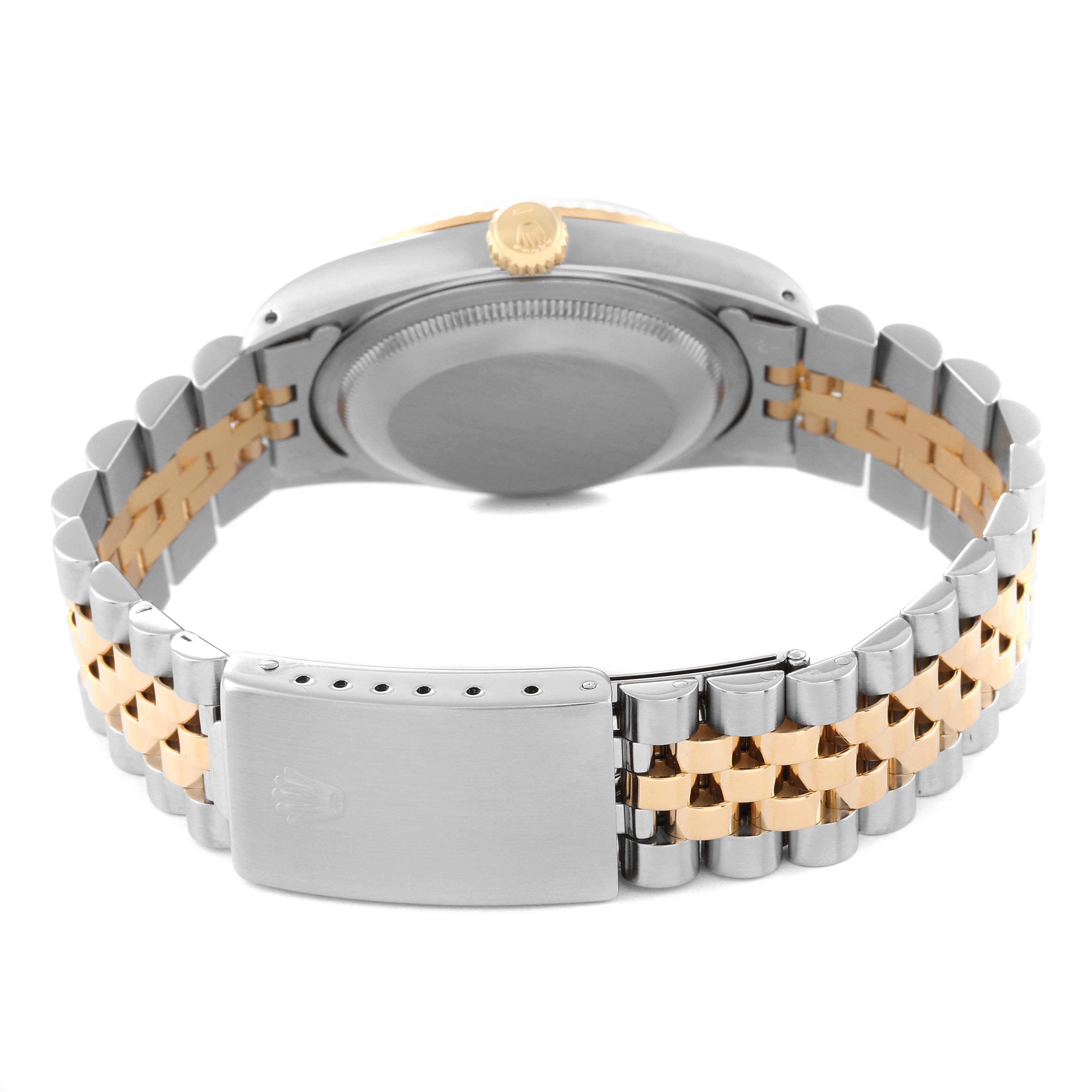 The image shows the back and bracelet of a Rolex Datejust 16233 Men's Steel and Gold (two tone) Champagne Dial 16233 Men's Steel and Gold (two tone) Champagne Dial watch, highlighting the two-tone metal links and clasp.
