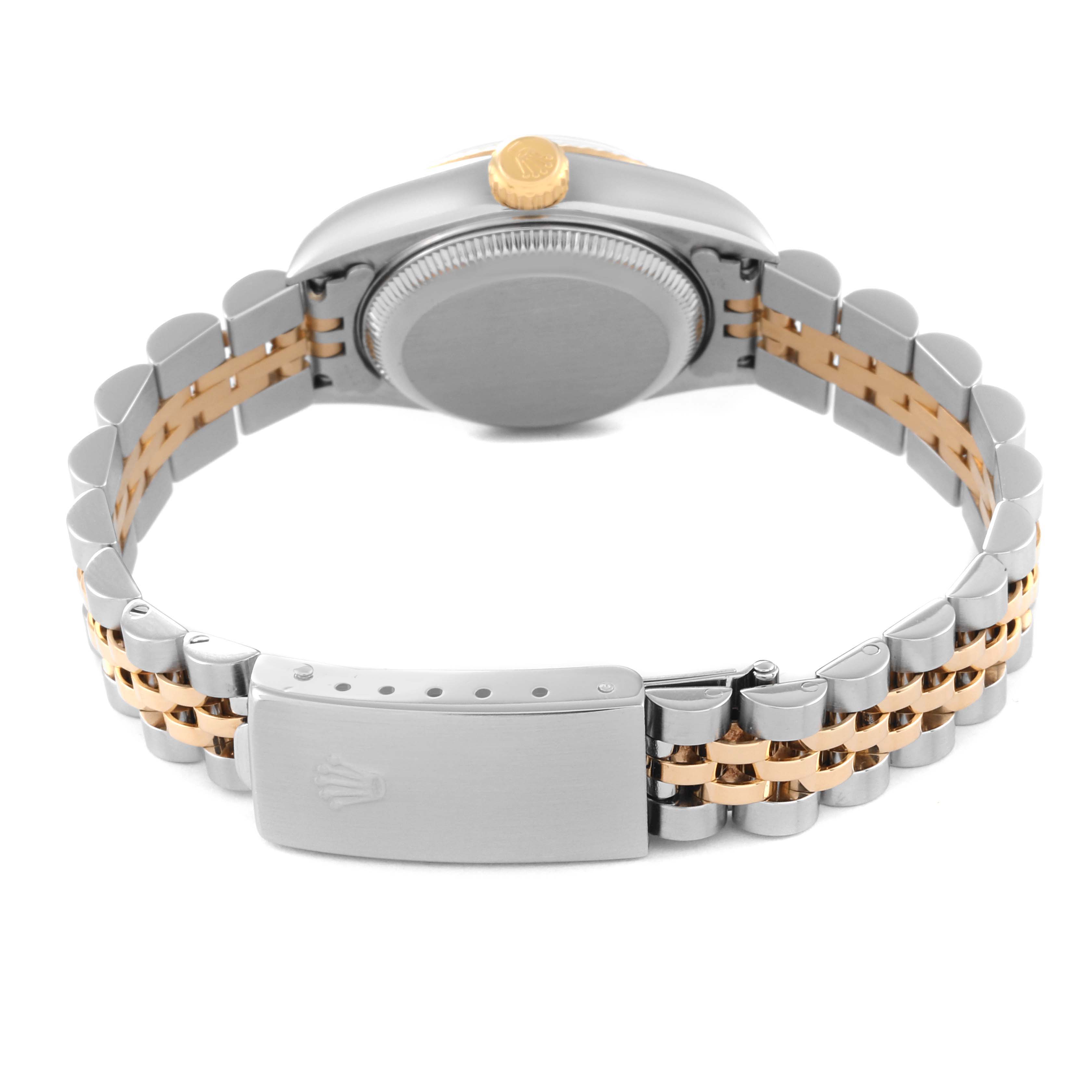 The image shows the back side of the Rolex Datejust 79173 Women's Steel and Gold (two tone) Champagne Dial 79173 Women's Steel and Gold (two tone) Champagne Dial watch, highlighting its clasp, bracelet, and case back.