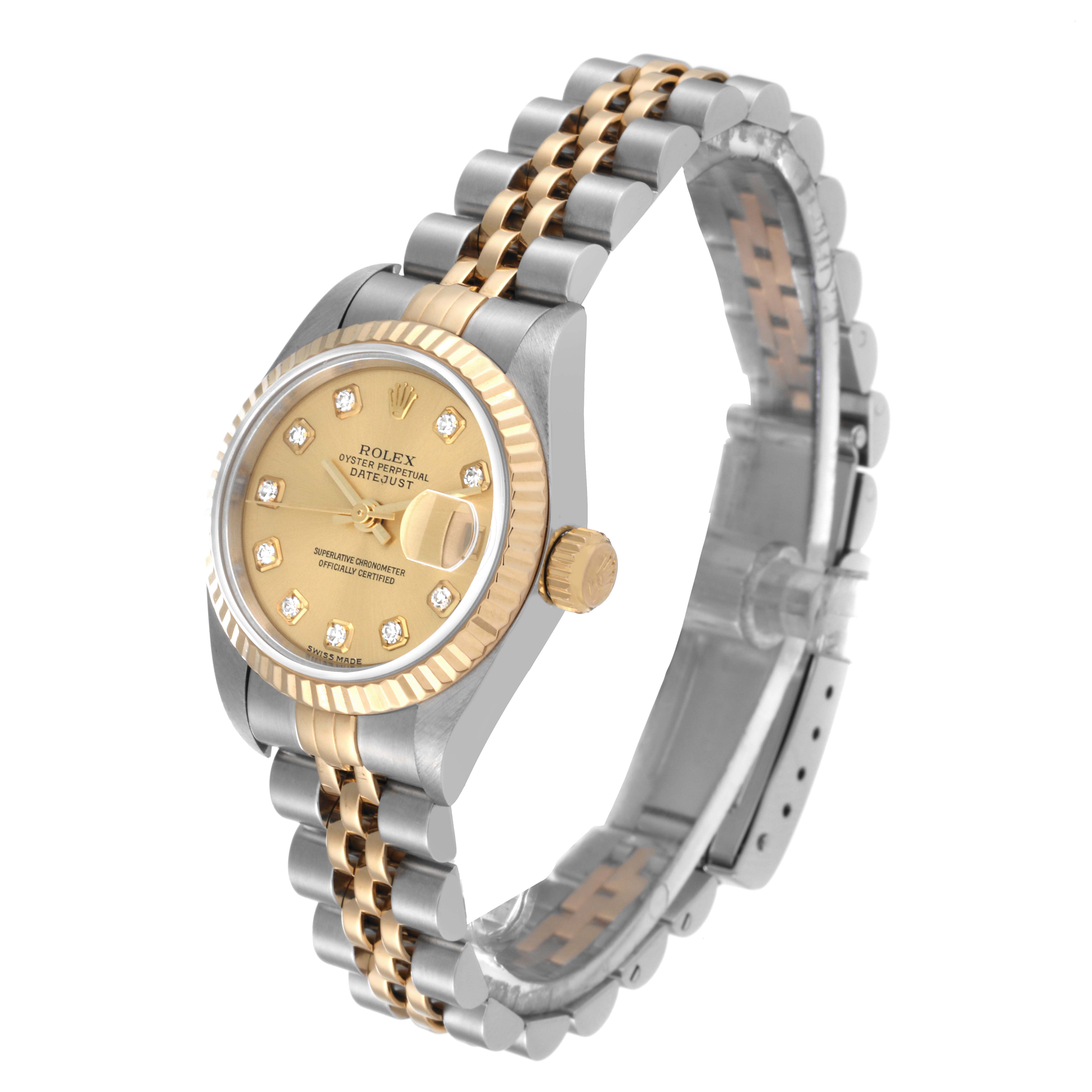 The image shows a Rolex Datejust 79173 Women's Steel and Gold (two tone) Champagne Dial 79173 Women's Steel and Gold (two tone) Champagne Dial watch from a three-quarter angle, highlighting the face, bezel, crown, and bracelet.