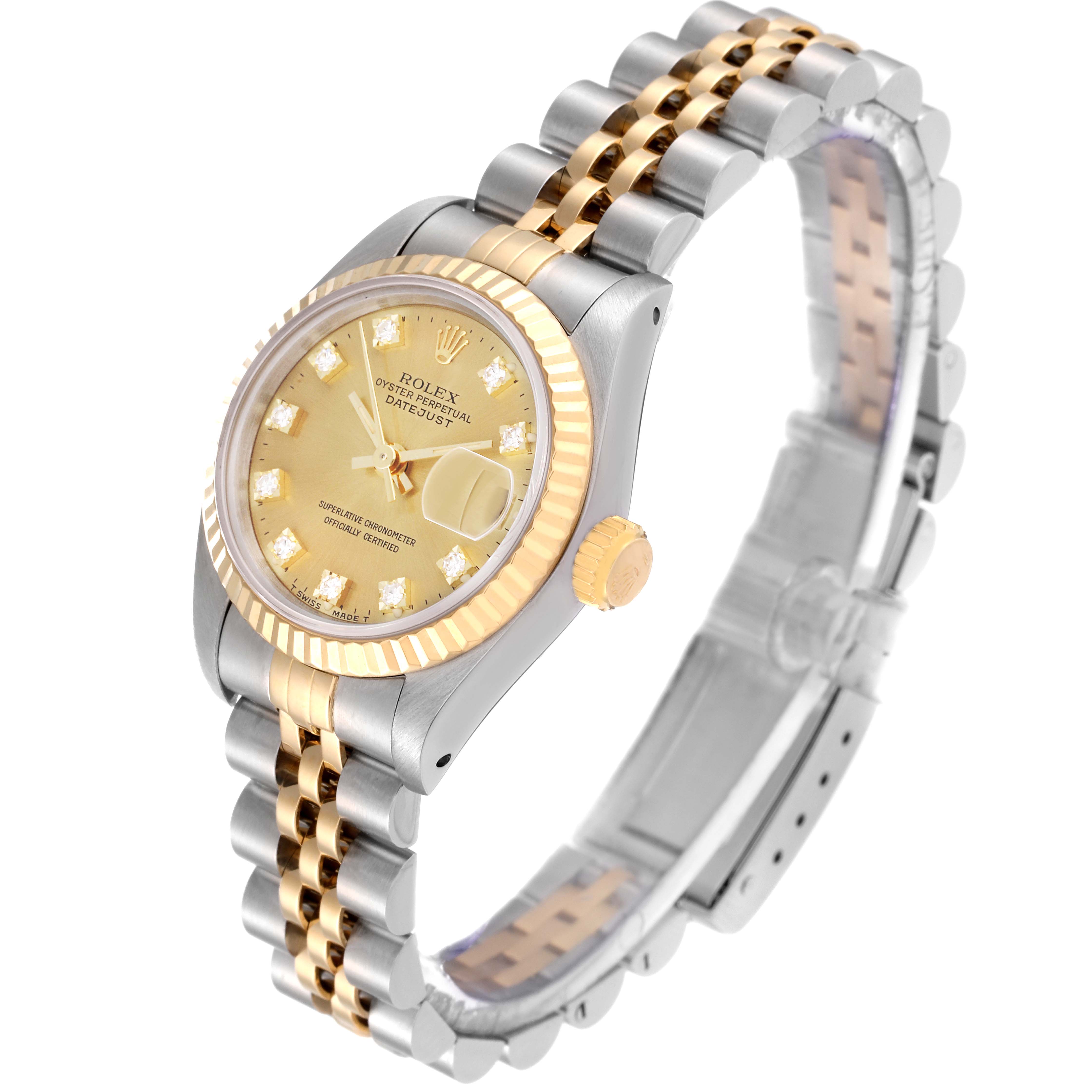 The Rolex Datejust 69173 Women's Steel and Gold (two tone) Champagne Dial 69173 Women's Steel and Gold (two tone) Champagne Dial watch is shown at an angled side view, highlighting its gold and silver band and champagne dial.