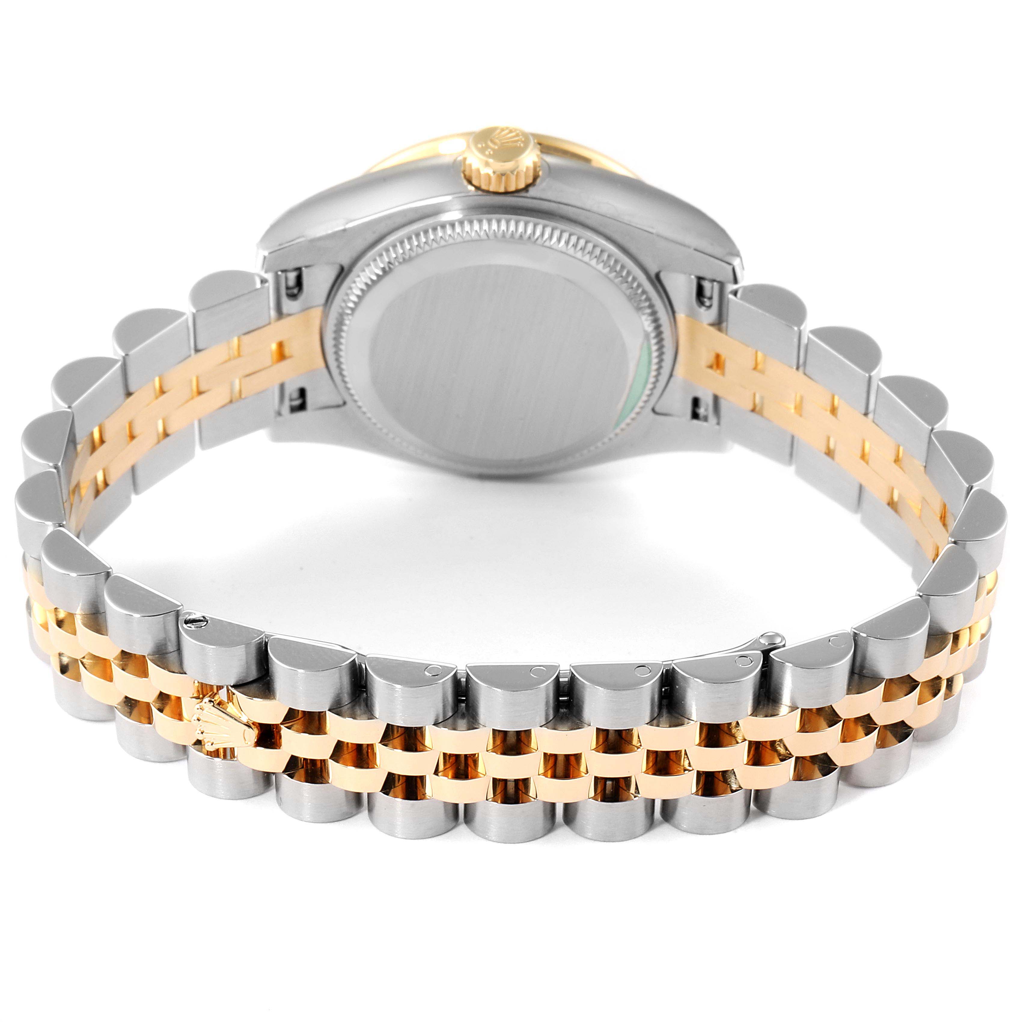The image shows the back view of a Rolex Datejust 179383 Women
s Steel and Gold (two tone) Silver Dial 179383 Women
s Steel and Gold (two tone) Silver Dial watch, highlighting its caseback and two-tone bracelet.