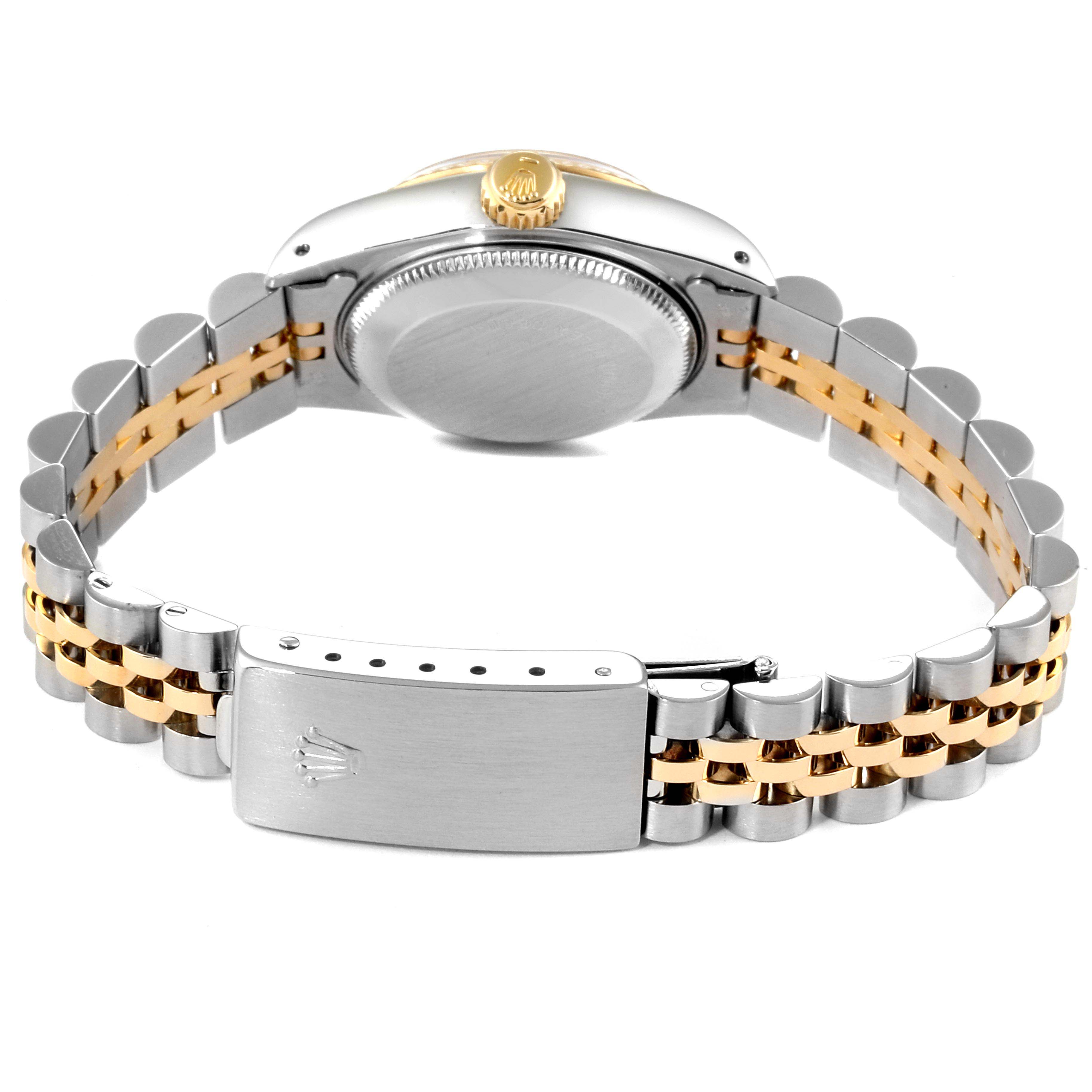 The image shows the back view of a Rolex Datejust 69173 Women
s Steel and Gold (two tone) Champagne Dial 69173 Women
s Steel and Gold (two tone) Champagne Dial, highlighting the bracelet and clasp in a combination of stainless steel and gold.