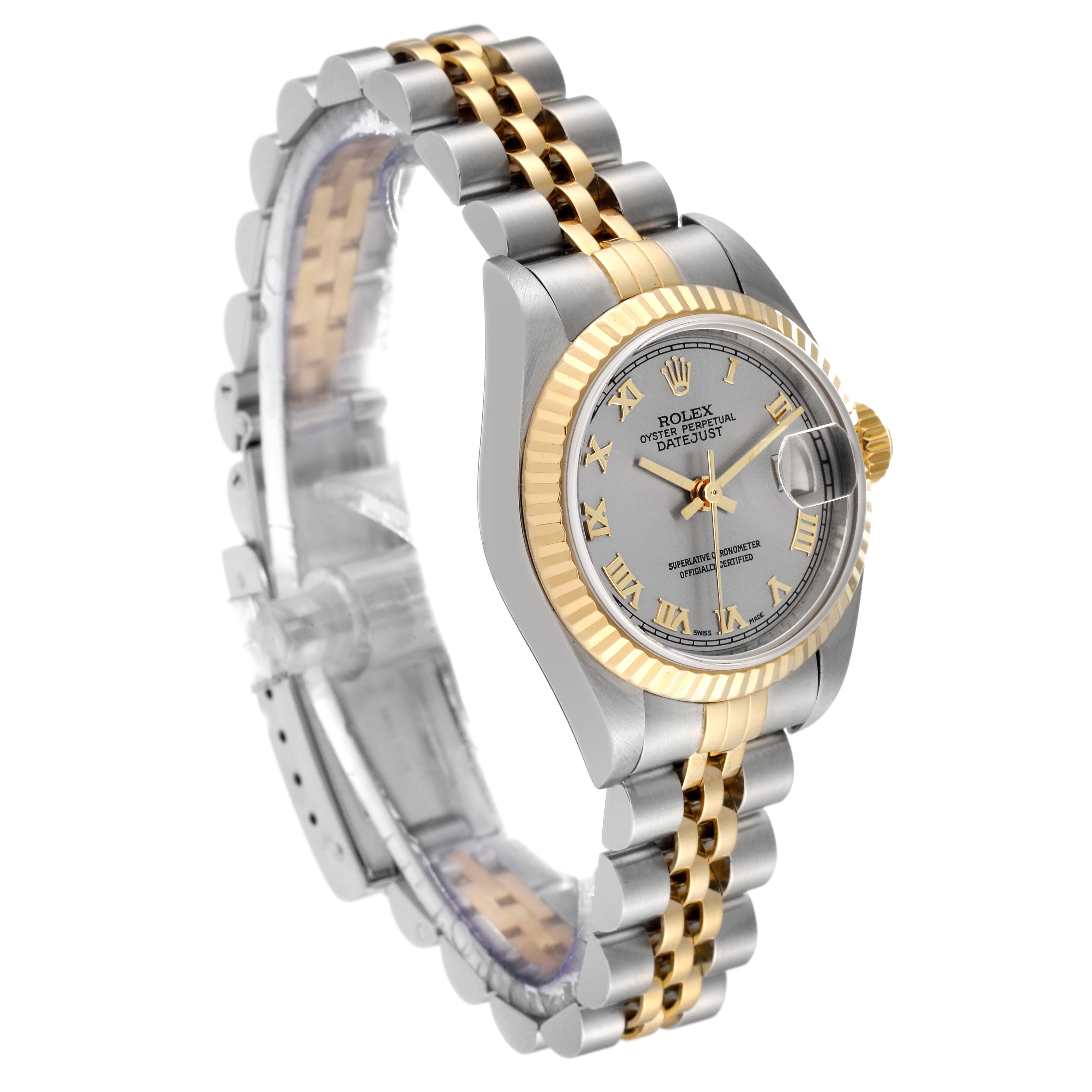 This Rolex Datejust 79173 Women's Steel and Gold (two tone) Grey Dial 79173 Women's Steel and Gold (two tone) Grey Dial watch is shown at a three-quarter angle, highlighting the dial, fluted bezel, and two-tone bracelet.