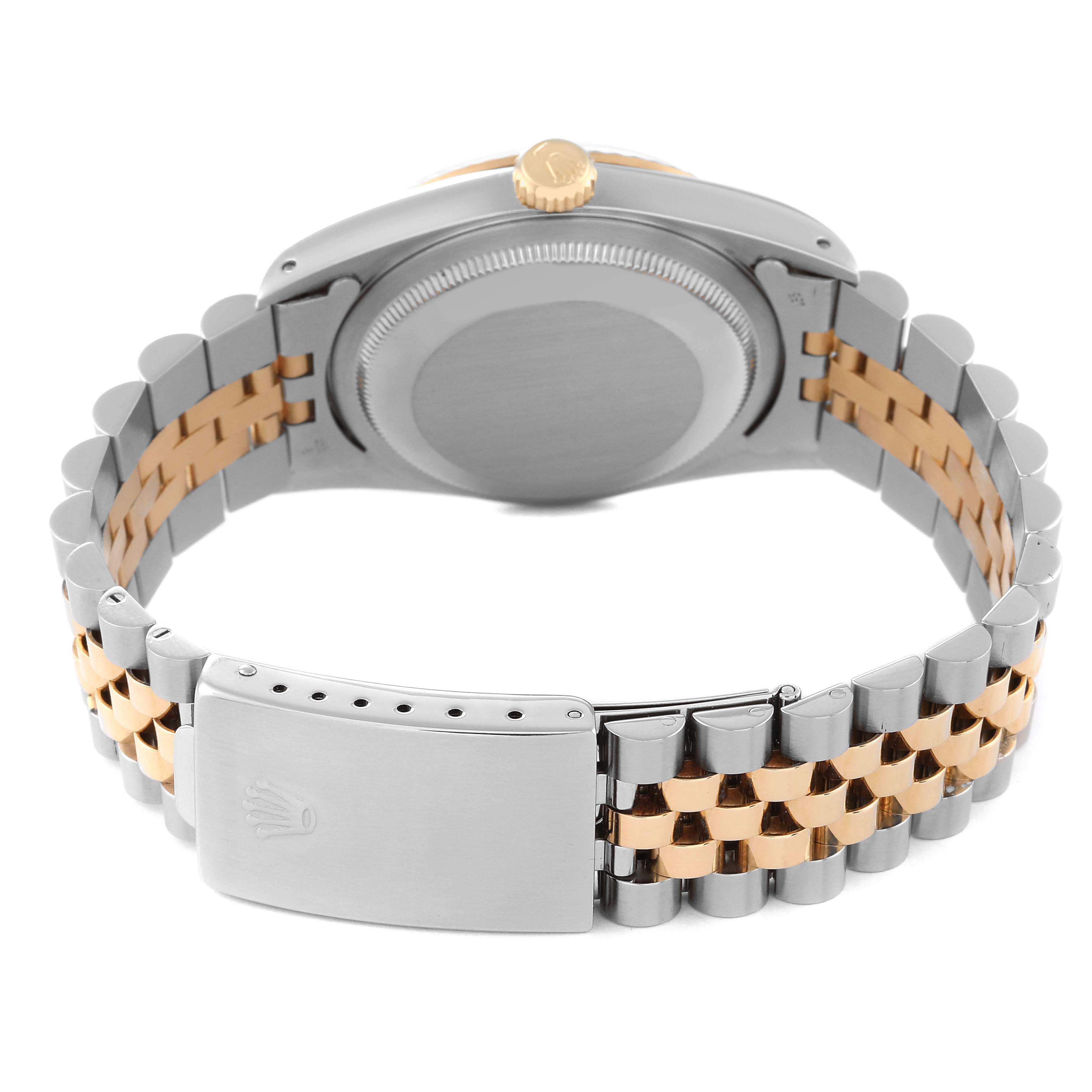 This image shows the back of a Rolex Datejust 16233 Men's Steel and Gold (two tone) Grey Dial 16233 Men's Steel and Gold (two tone) Grey Dial watch, highlighting its two-tone bracelet and clasp.