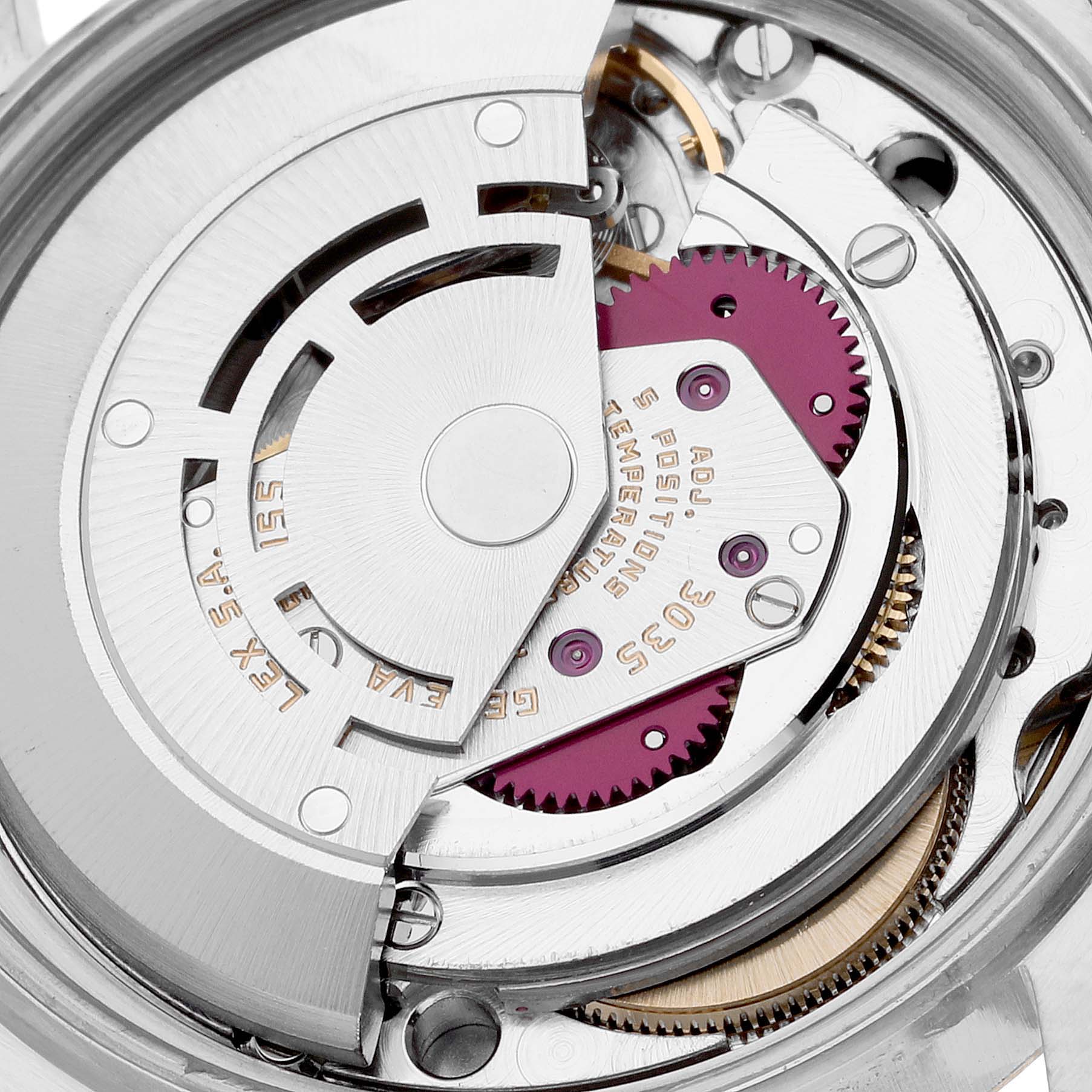 The image shows an up-close view of the intricate inner mechanical parts of a Vintage Collection model by Rolex.