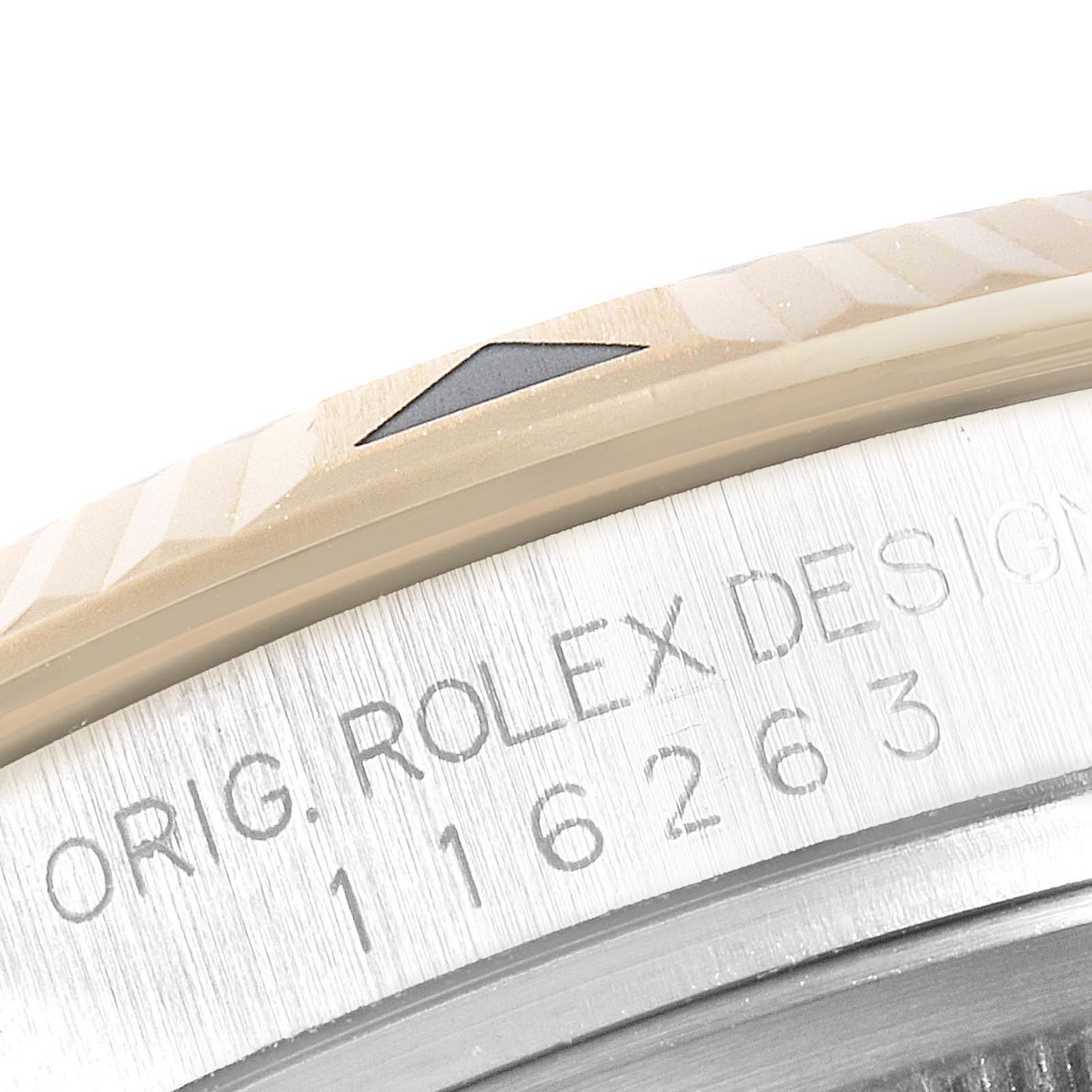 This is a close-up angle showing the bezel and engraved model details of the Rolex Turn-o-Graph 116263 Men
s Steel and Gold (two tone) Champagne Dial 116263 Men
s Steel and Gold (two tone) Champagne Dial watch.