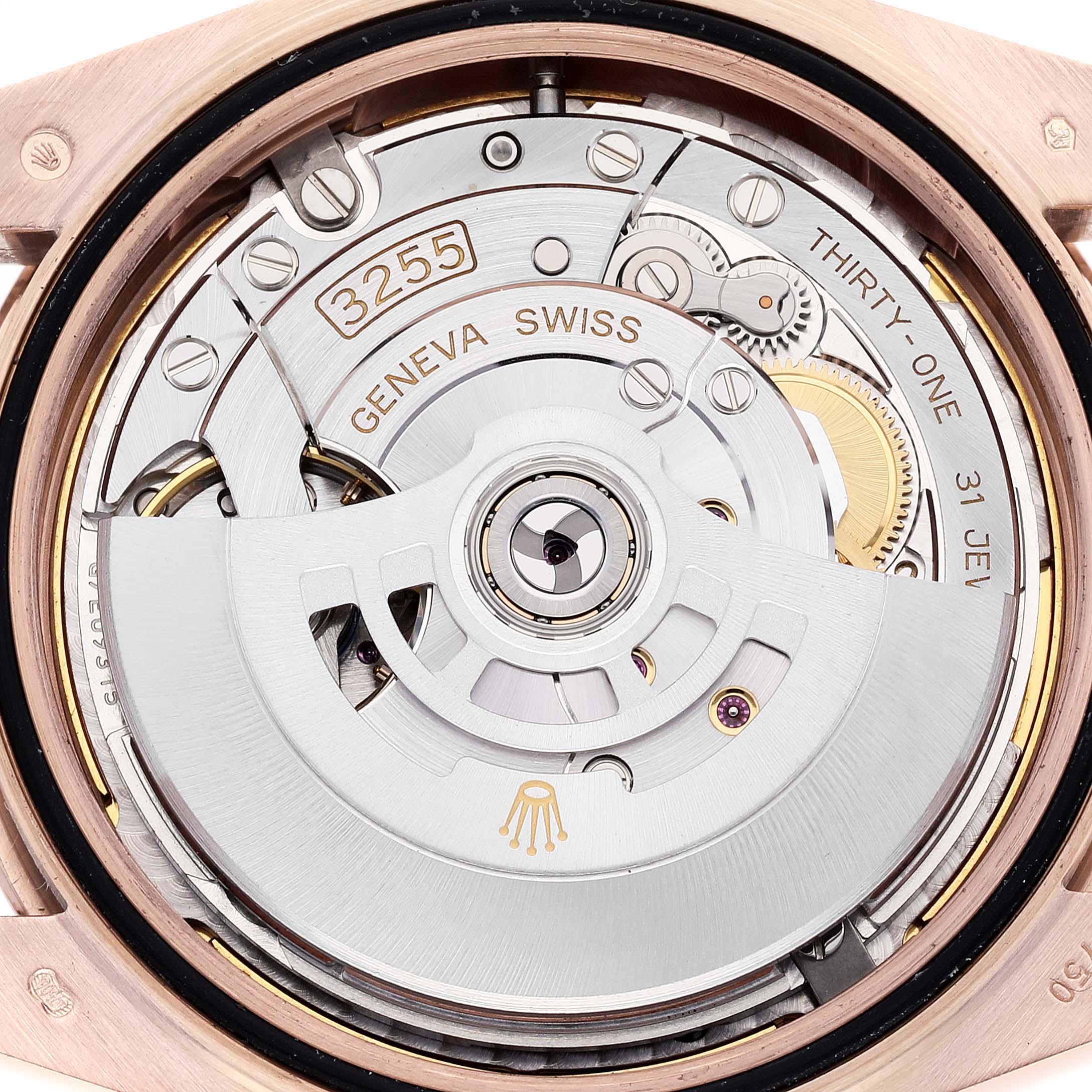 This image shows the intricate inner mechanism and rotor of the Rolex President 228235 Men's Rose Gold Brown Dial 228235 Men's Rose Gold Brown Dial model watch.